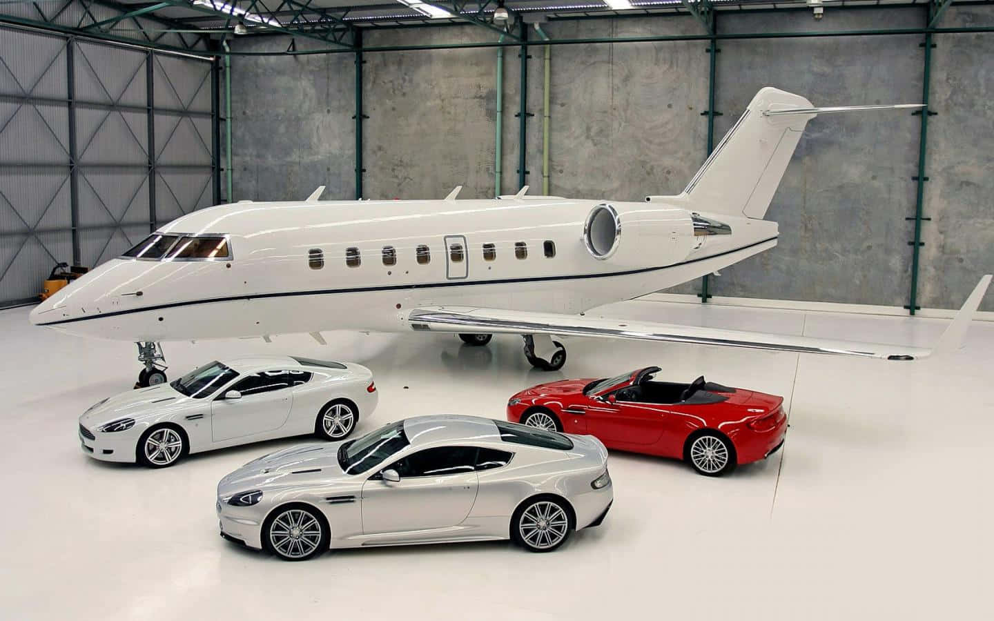 1440x900 Download Private Jet With Luxury Cars Wallpaper