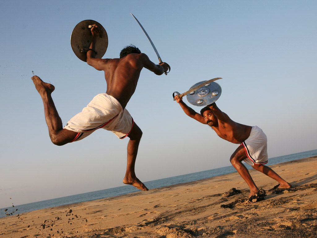 1024x768 Kalarippayattu is Kerala's unique martial art distinctive brand of acrobatic combat drawing heavi. Martial arts, Male pose reference, Martial arts photography