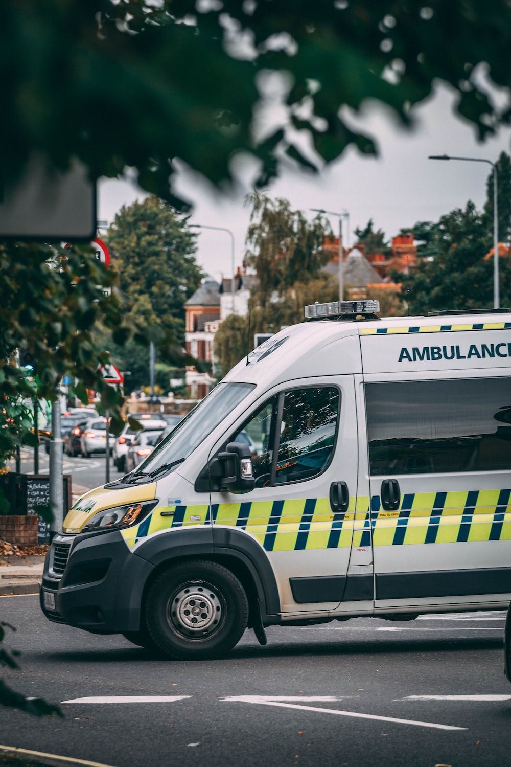 1000x1500 White and blue police car on road during daytime photo