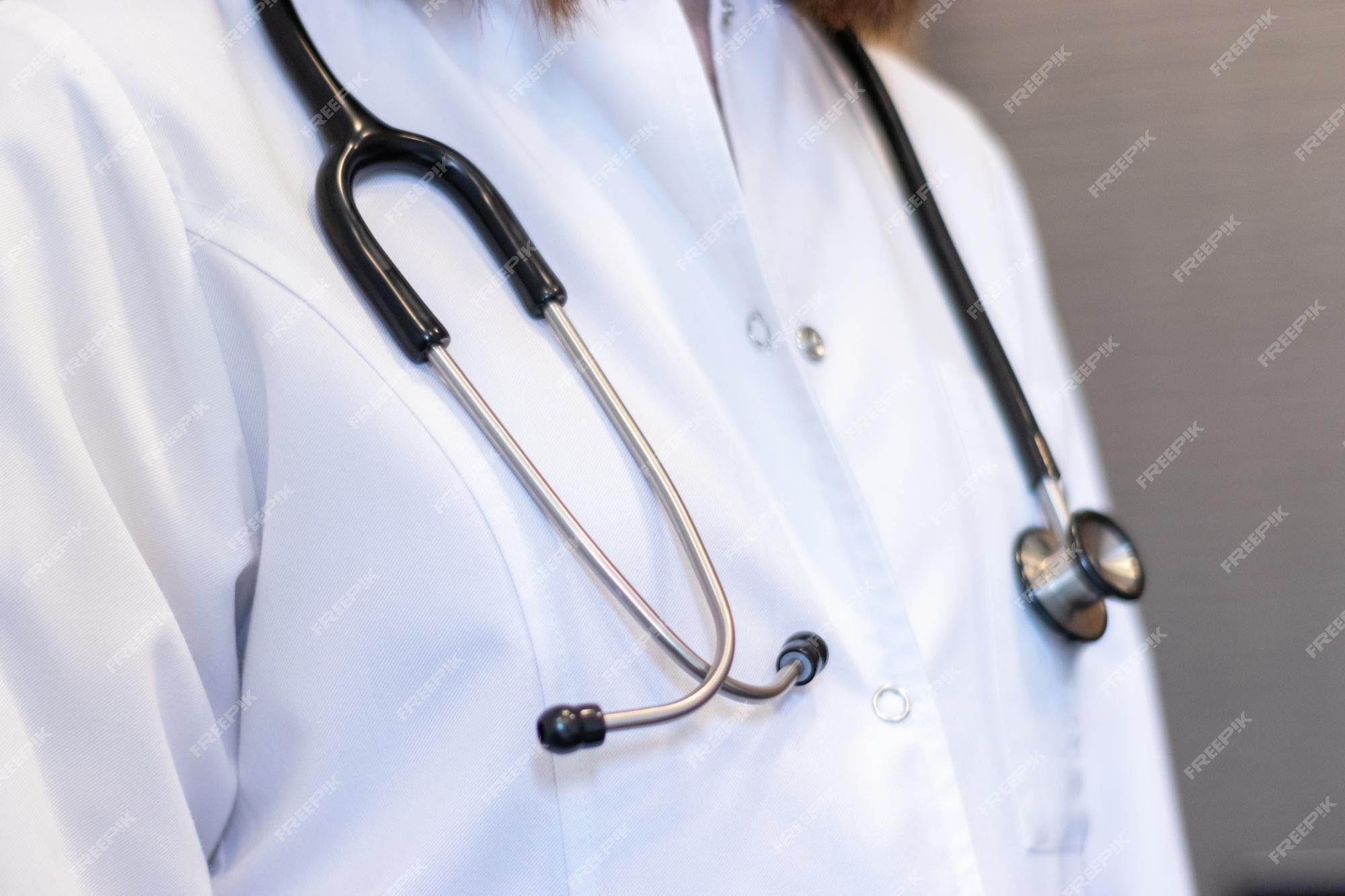 2000x1333 Premium Photo. Female doctor with stethoscope and white coat