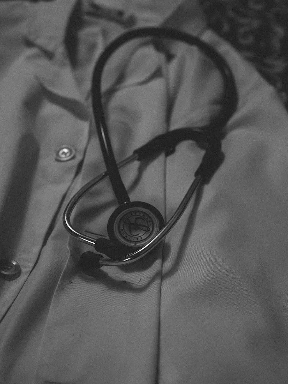 1000x1332 A black and white photo of a doctor's coat with a stethos photo