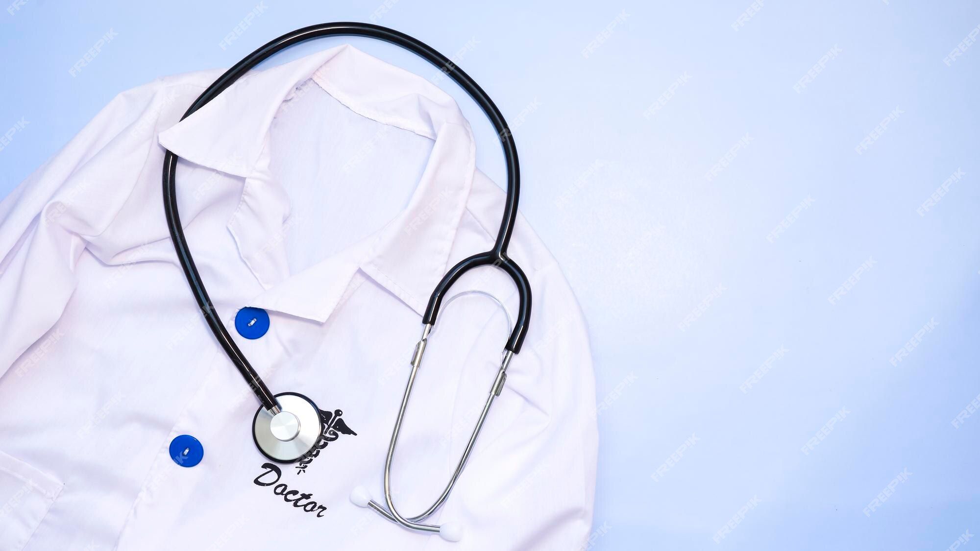2000x1125 Premium Photo. Doctor's coat and stethoscope on a blue background