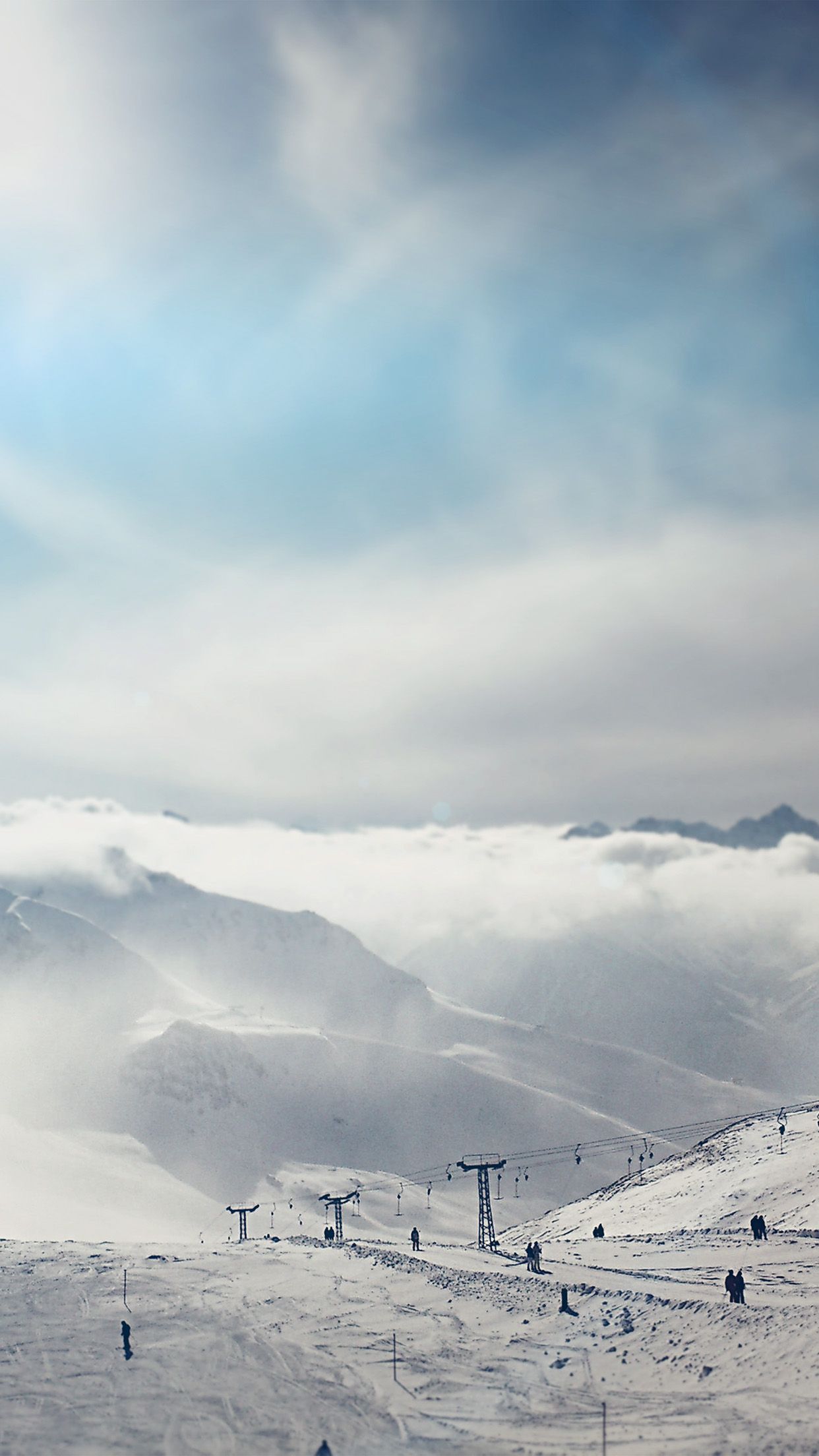 1242x2208 Snow Ski Winter Play Mountain Sunny Bokeh Flare Blue Wallpaper