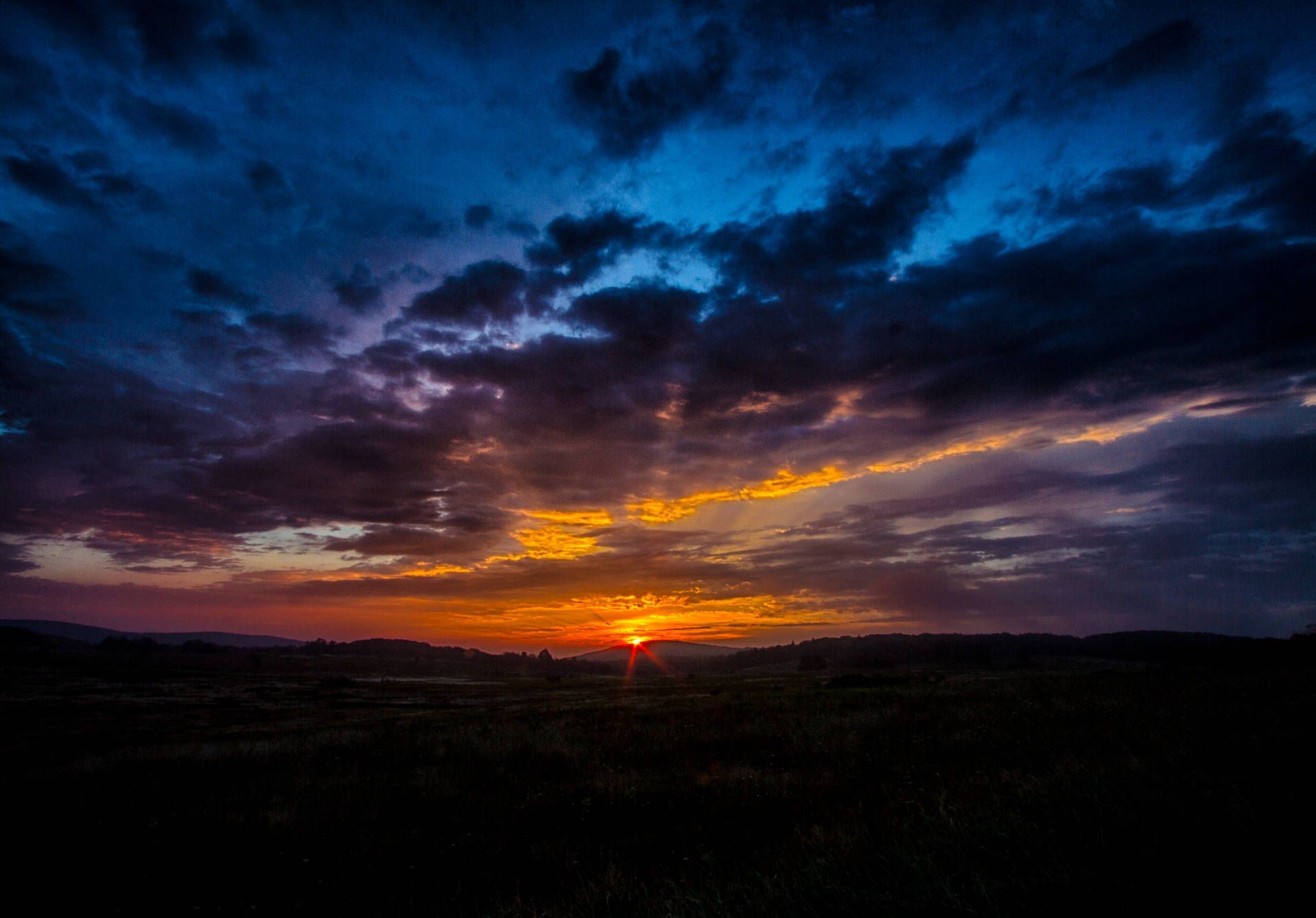 1920x1340 Download Witness the beauty of dark mountains in this beautiful orange sunrise! Wallpaper