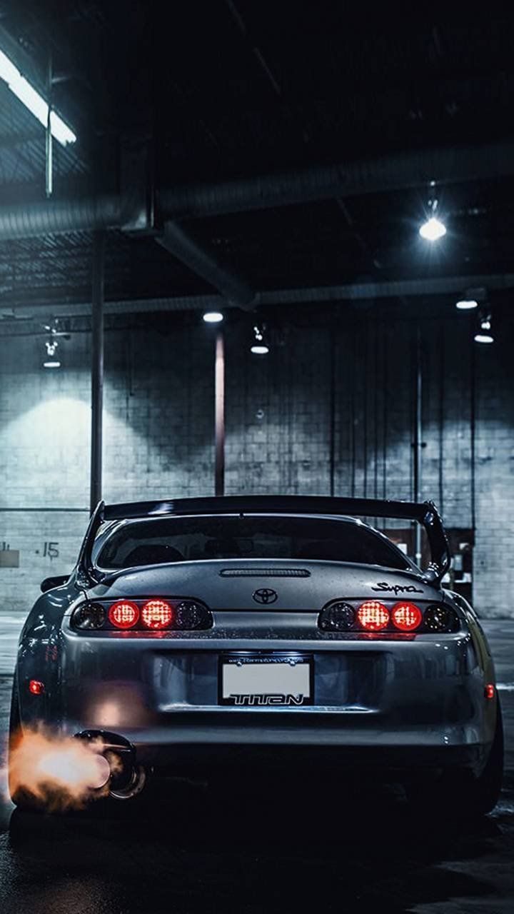 720x1280 Supra fire exhaust Wallpaper Download