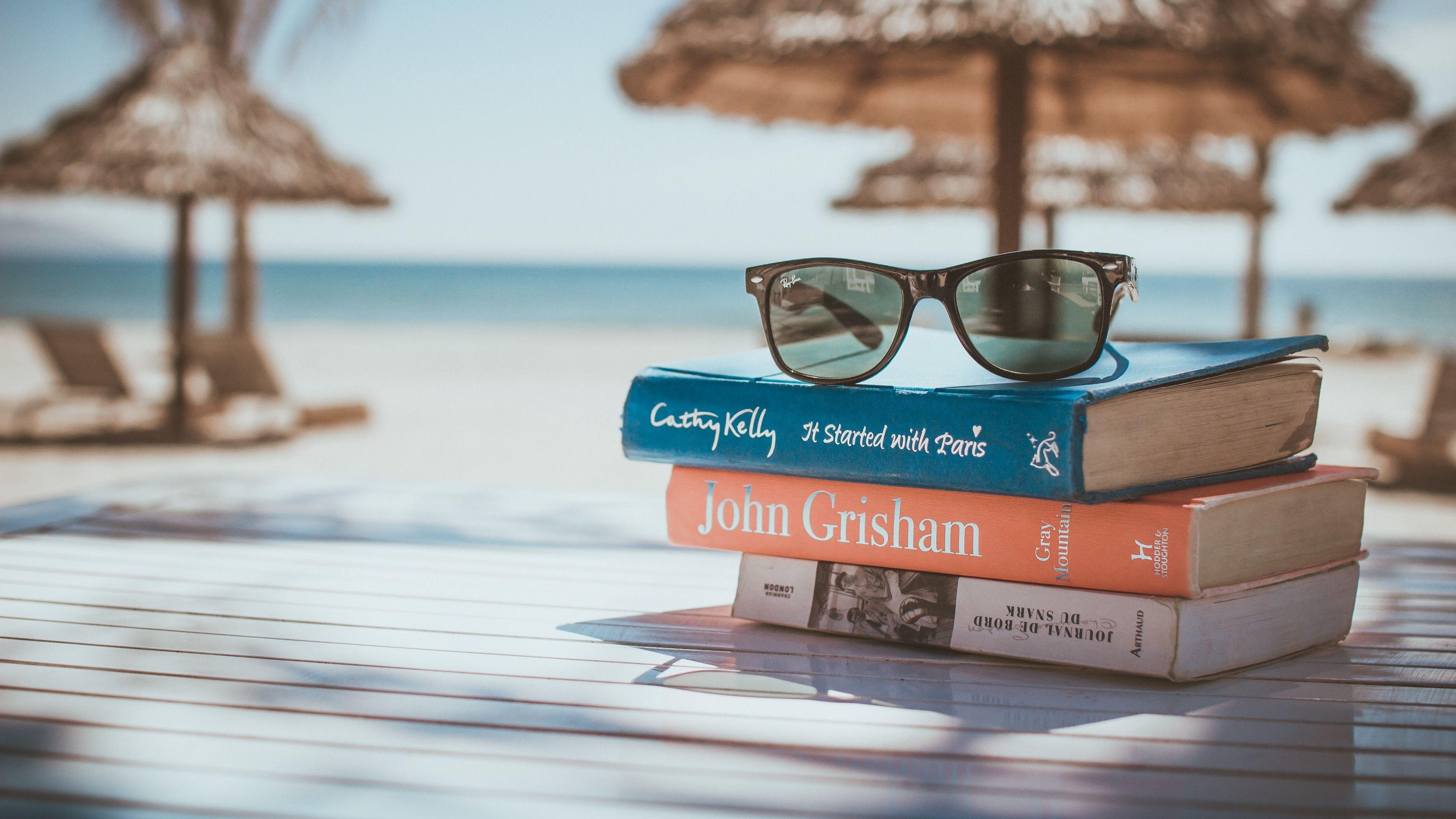 3840x2160 Download wallpaper 3840x2160 sunglasses, books, beach, sun
