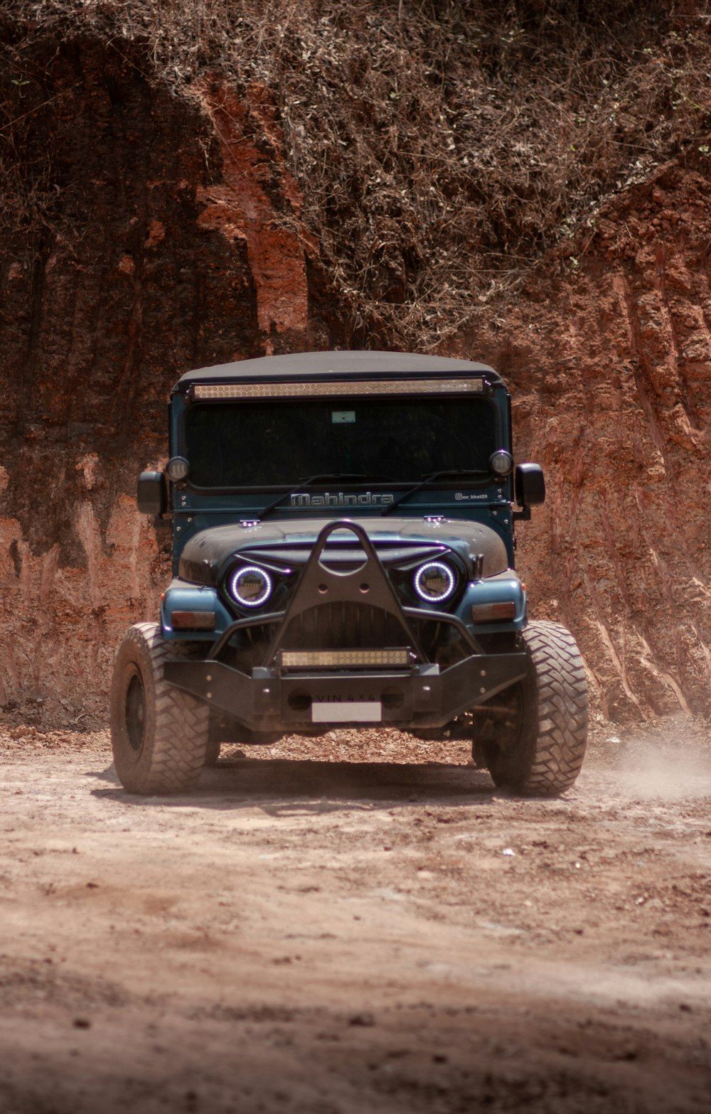 1000x1567 Blue and black jeep wrangler on dirt road during daytime photo
