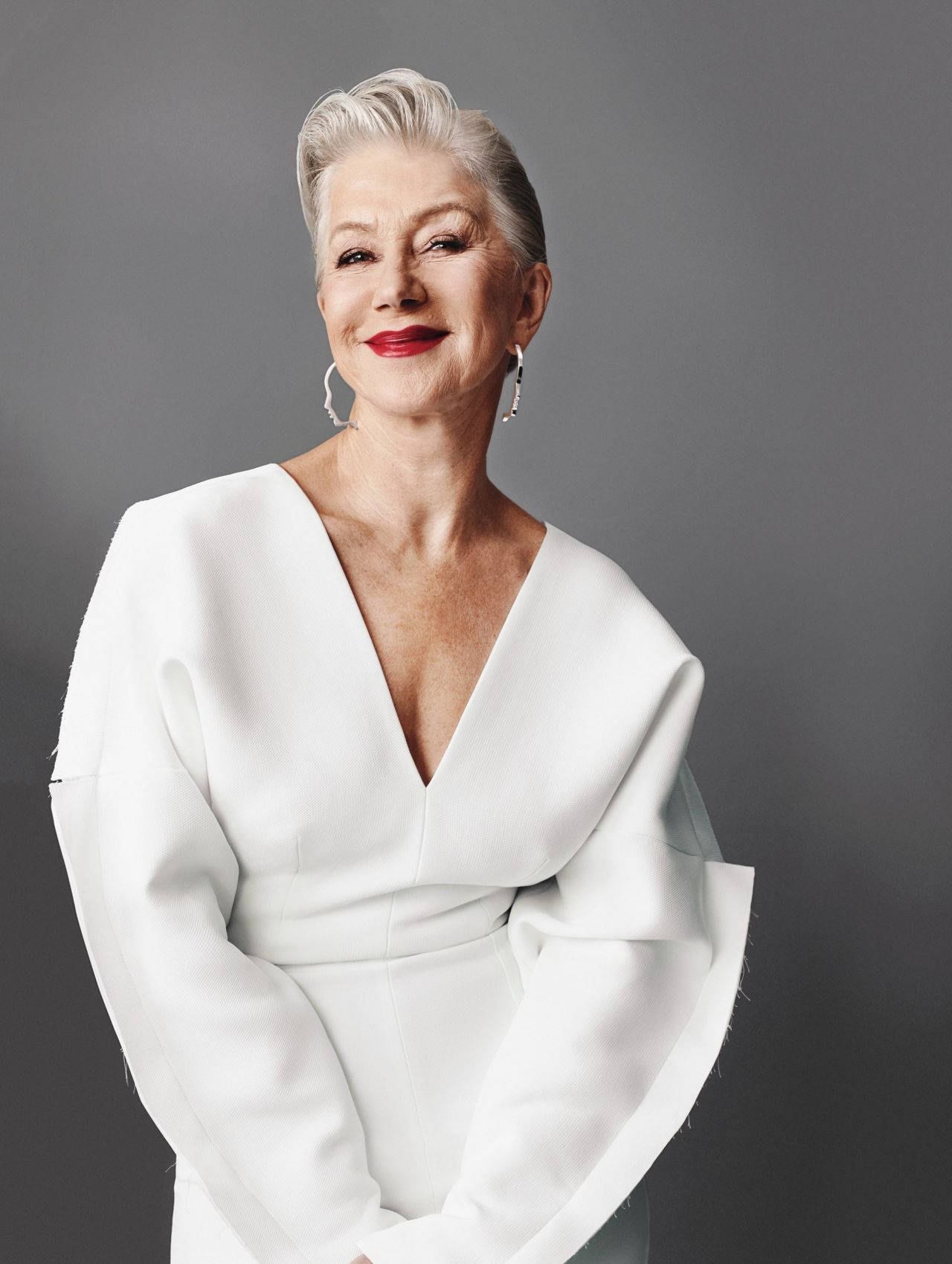 1280x1699 Download Legendary Actress Helen Mirren Posing Elegantly in a Professional Studio Photohoot Wallpaper