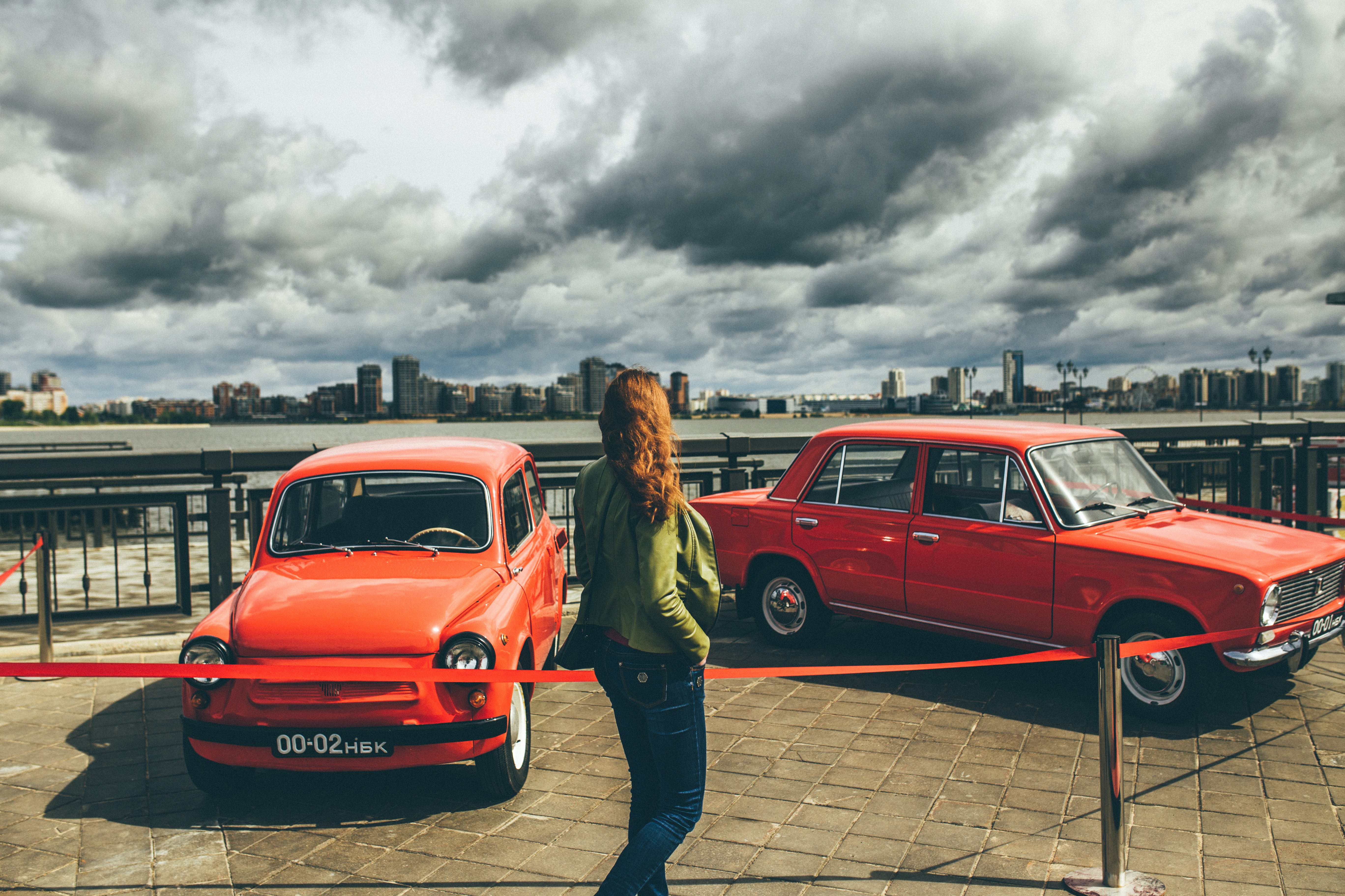 5472x3648 A Woman Looking the Classic Cars · Free