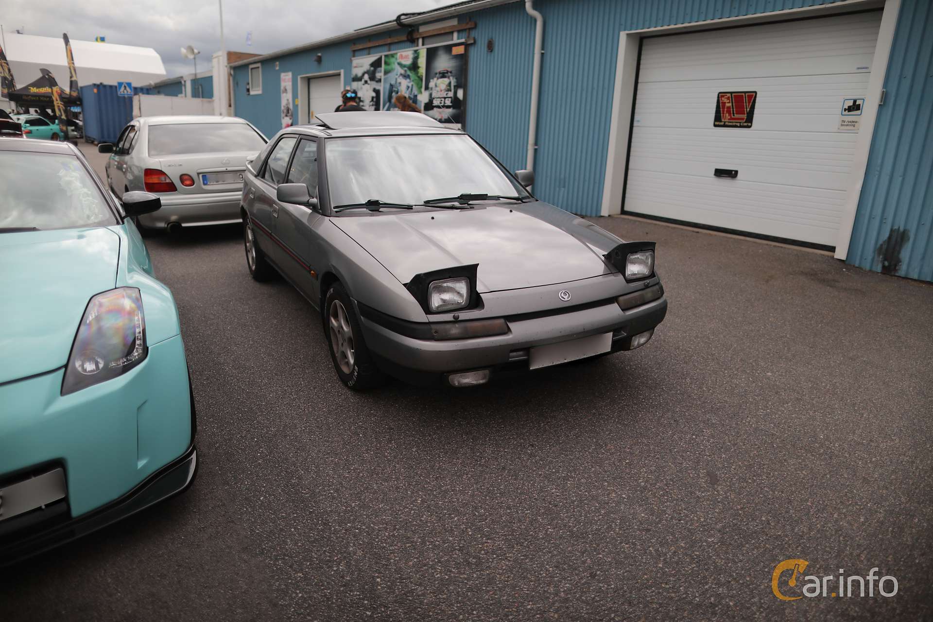 1920x1280 image of Mazda 323