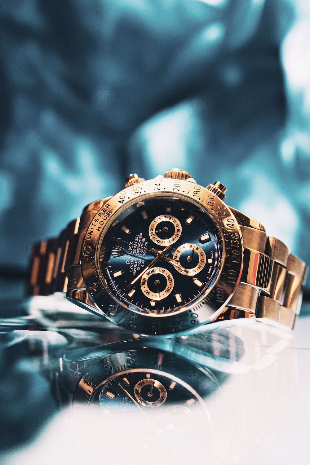 1000x1500 Silver and gold chronograph watch photo