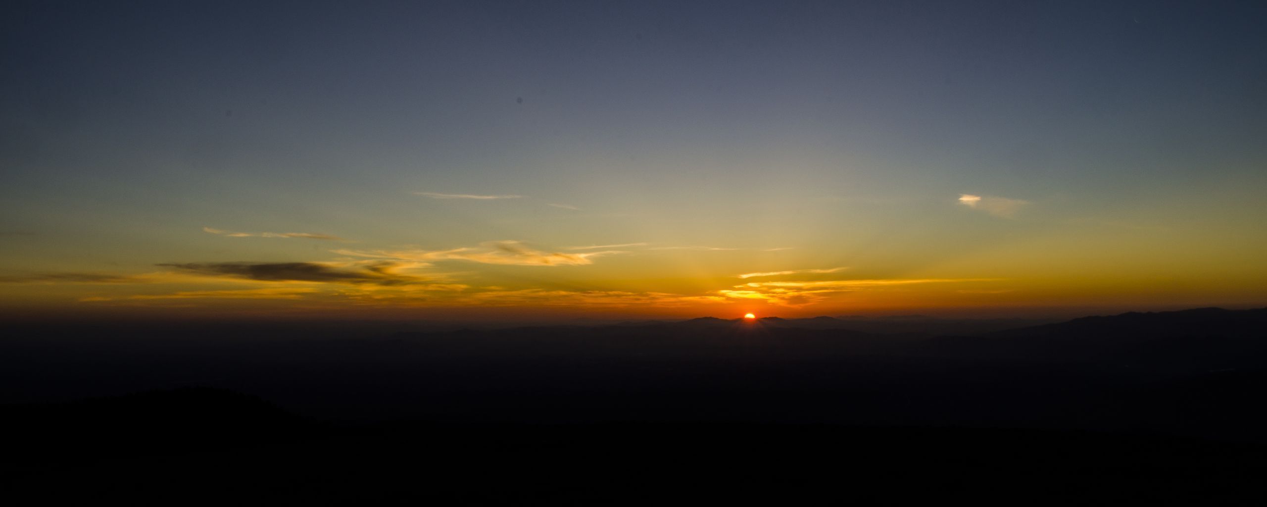 2560x1024 Download wallpaper 2560x1024 dawn, horizon, mountains, sun, sky, dark, sunrise ultrawide monitor HD background