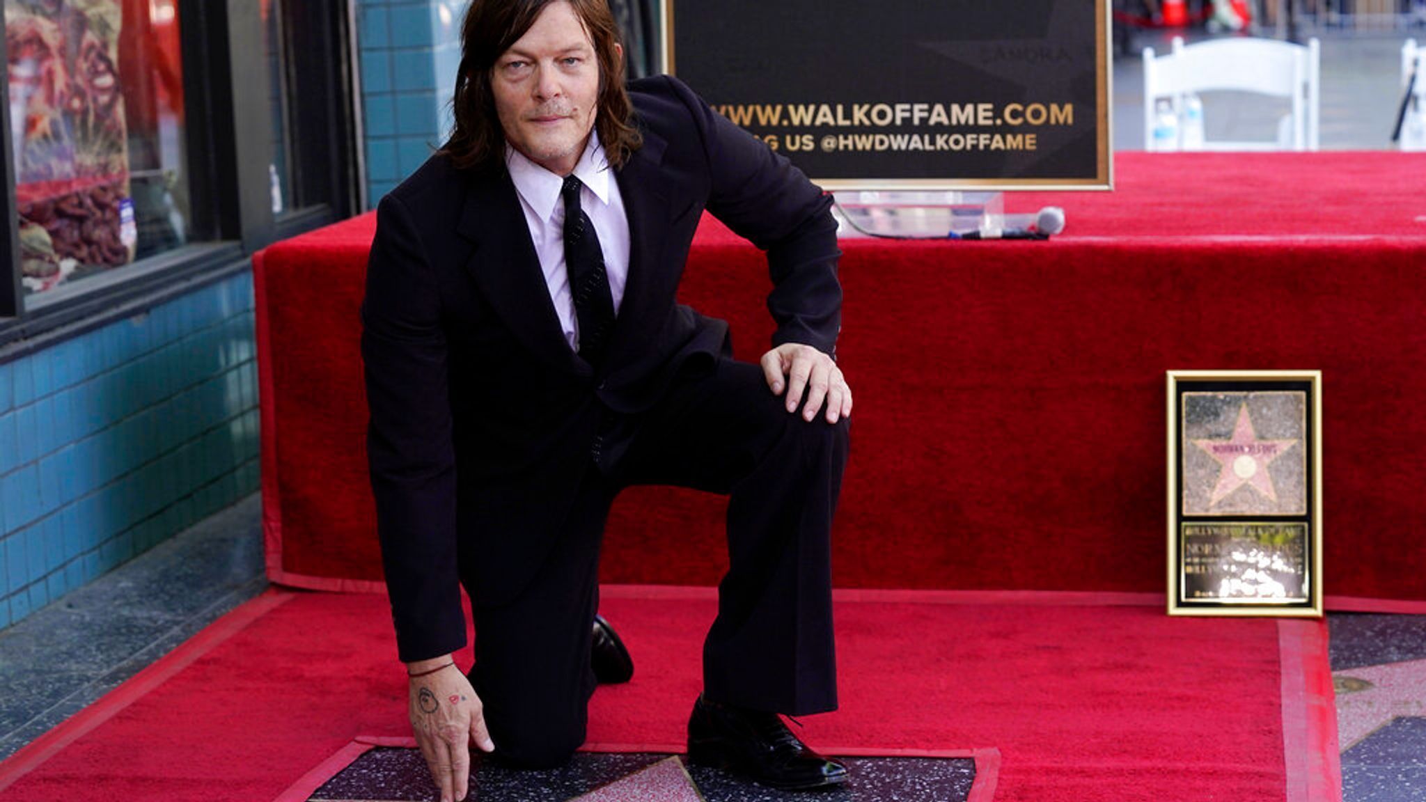 2048x1152 The Walking Dead star Norman Reedus gets a star on Hollywood's Walk of Fame. Ents & Arts News