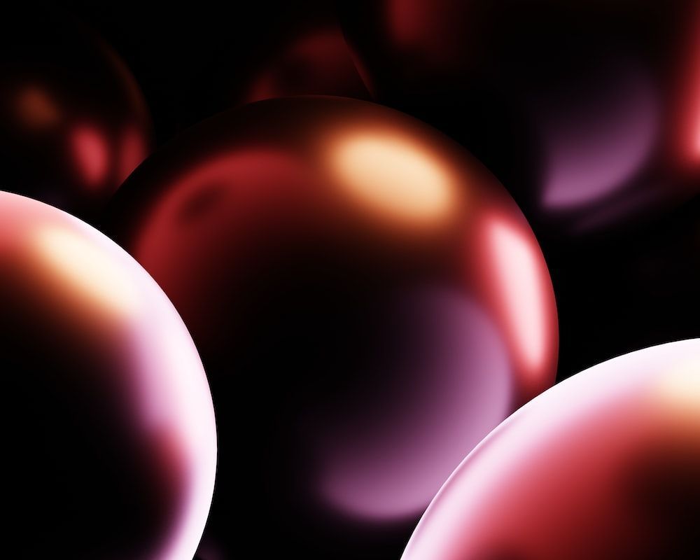 1000x800 A bunch of shiny red and purple balloons photo