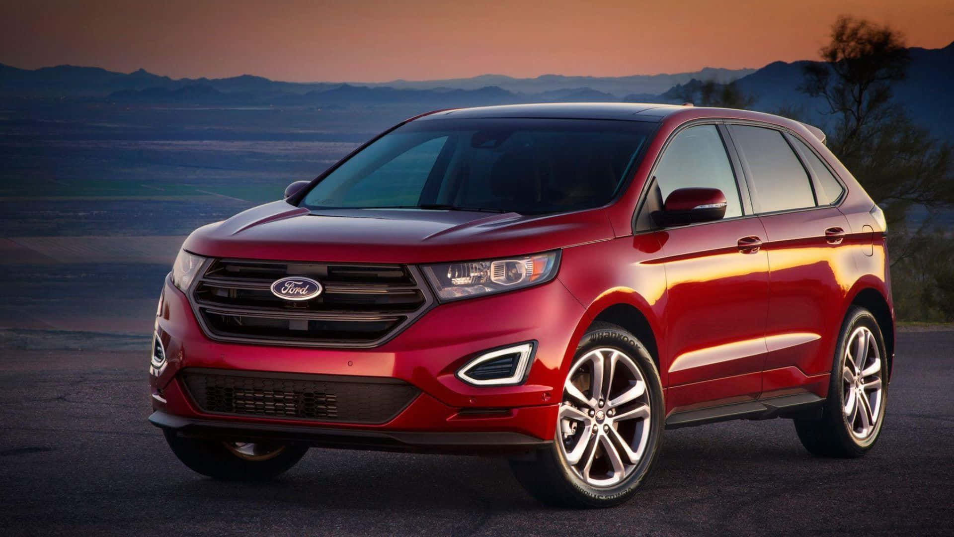 1920x1080 Download The Sleek and Stylish Ford Edge SUV Driving On a Scenic Route Wallpaper