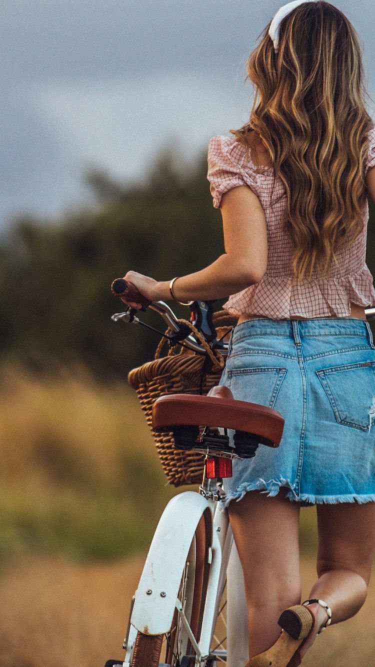 750x1334 Download wallpaper: Lady with her retro bike 750x1334