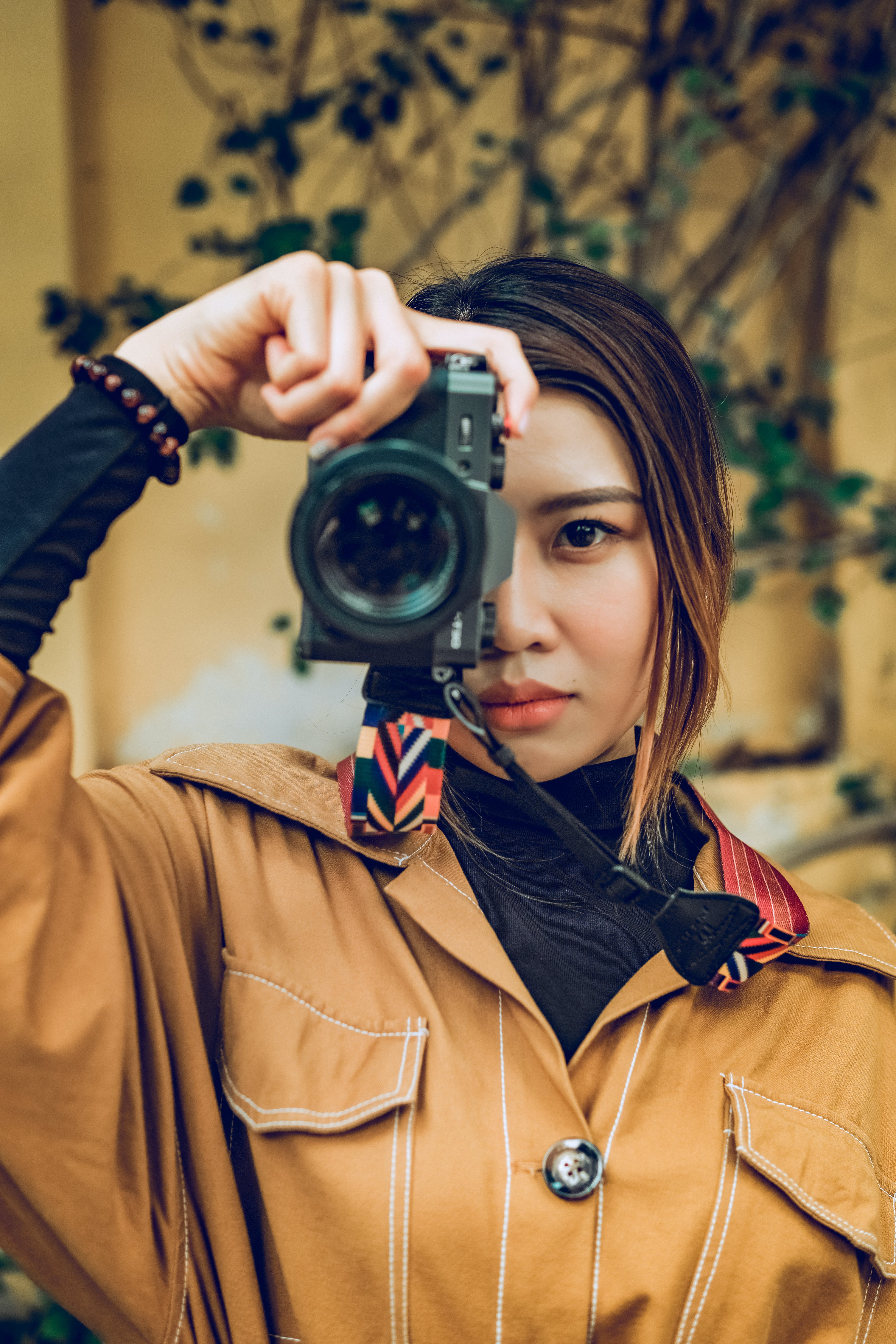 4160x6240 Girl with Camera Taking Photo on Balcony · Free