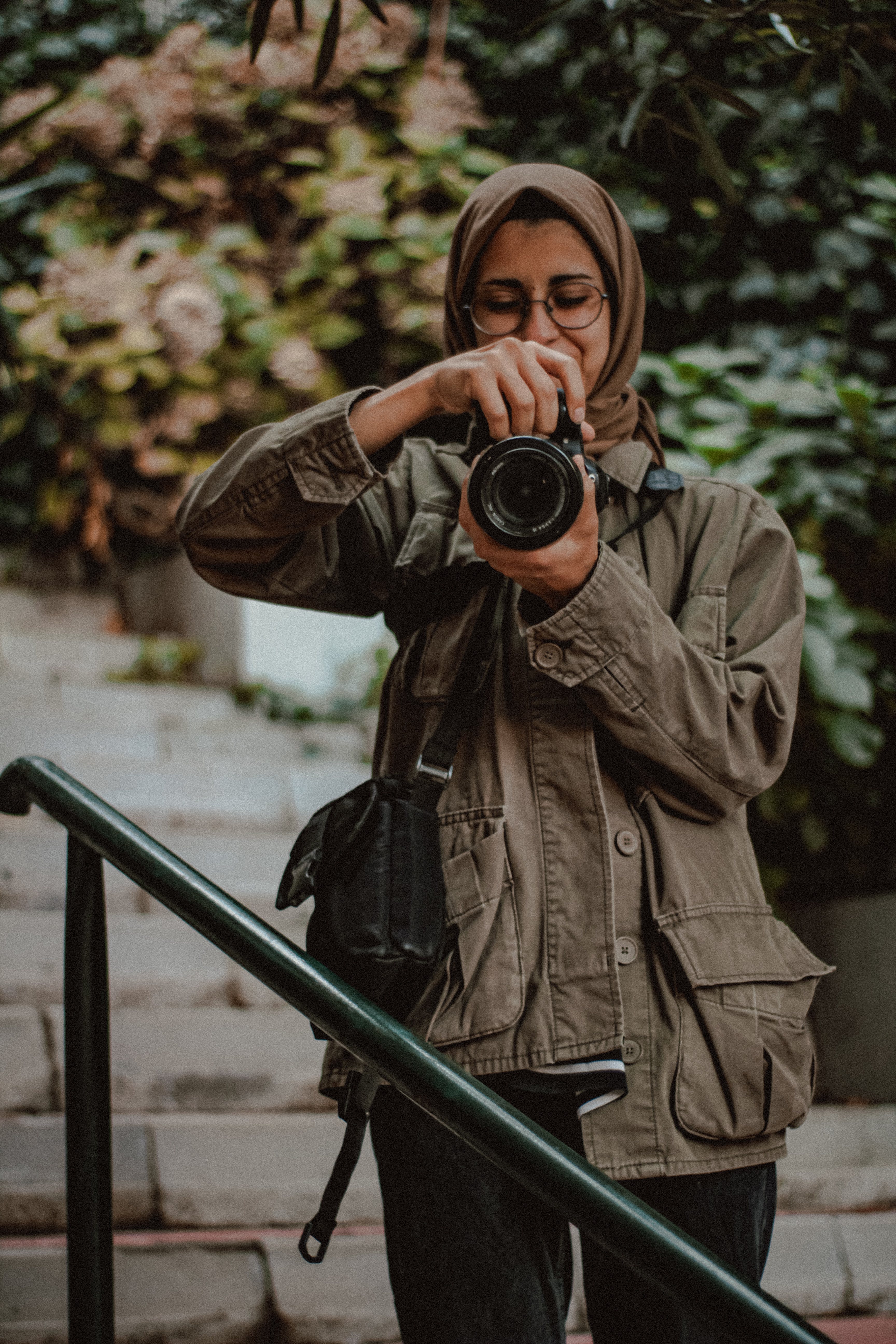 3456x5184 Woman Wearing a Brown Hijab using a DSLR Camera · Free