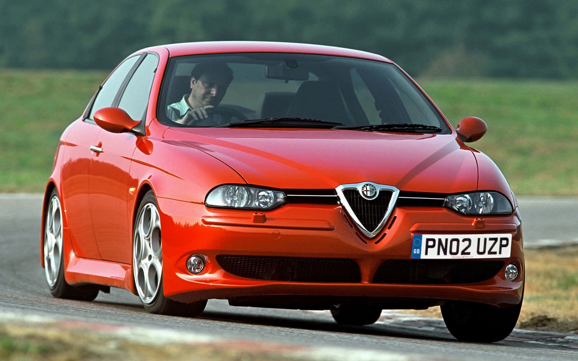 1920x1200 Download Sleek Alfa Romeo 156 in Motion Wallpaper