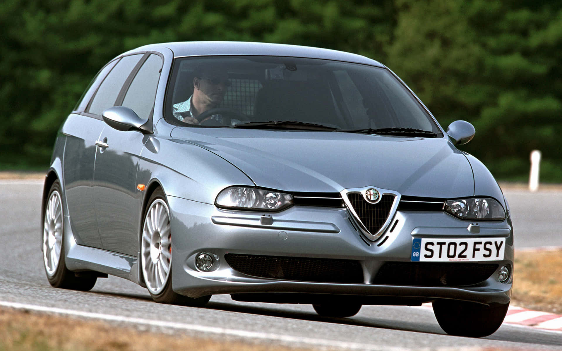 1920x1200 Download Sleek Red Alfa Romeo 156 in Motion Wallpaper