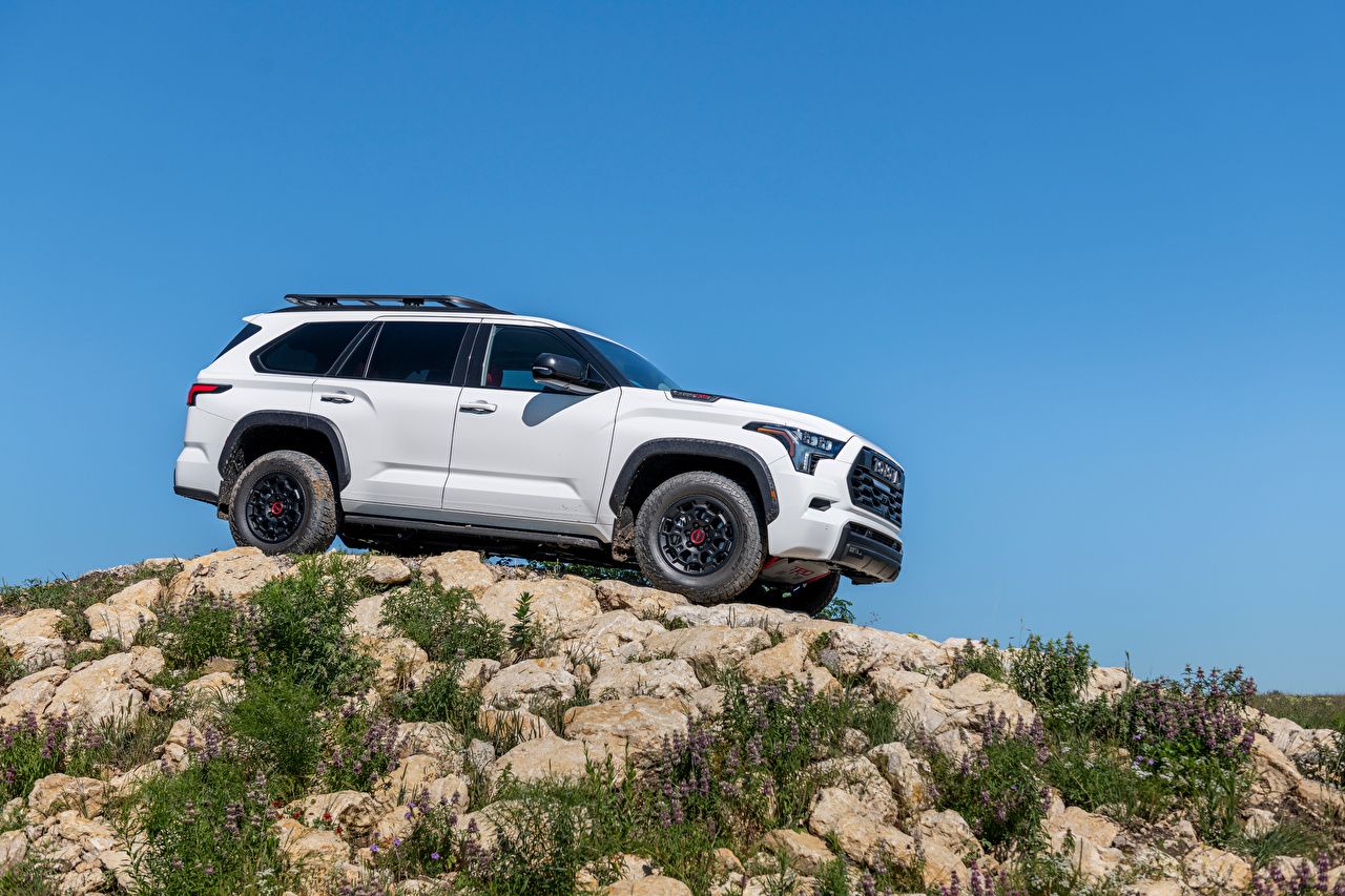 1280x853 Photos SUV Toyota Sequoia TRD Pro, 2022 White Side auto Stones