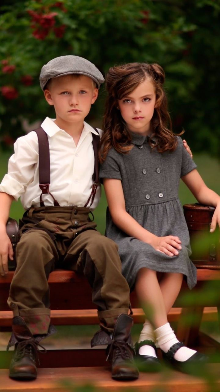 720x1280 Little Boy and Girl in Vintage Clothes