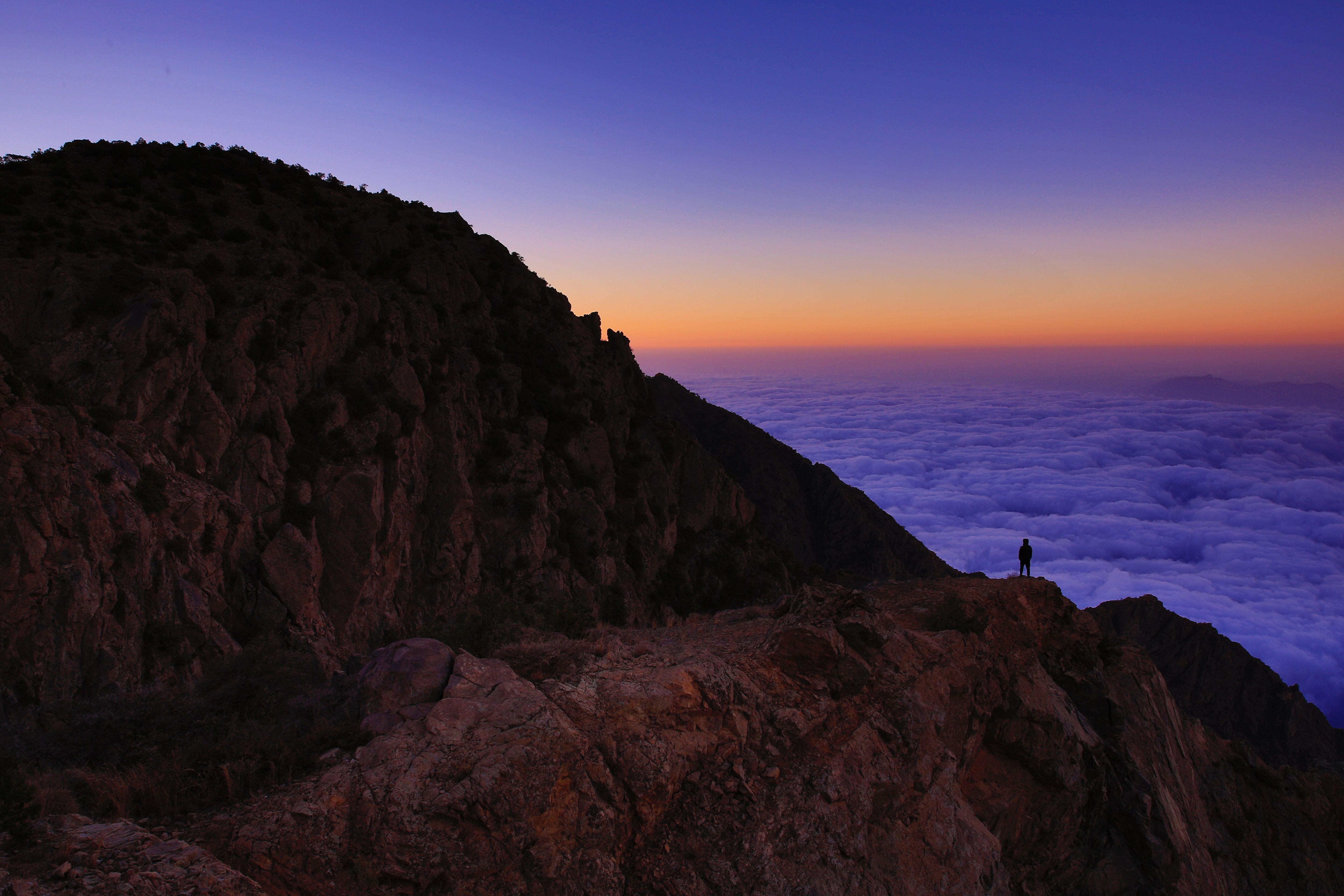 5760x3840 Download wallpaper 5760x3840 mountain, man, loneliness