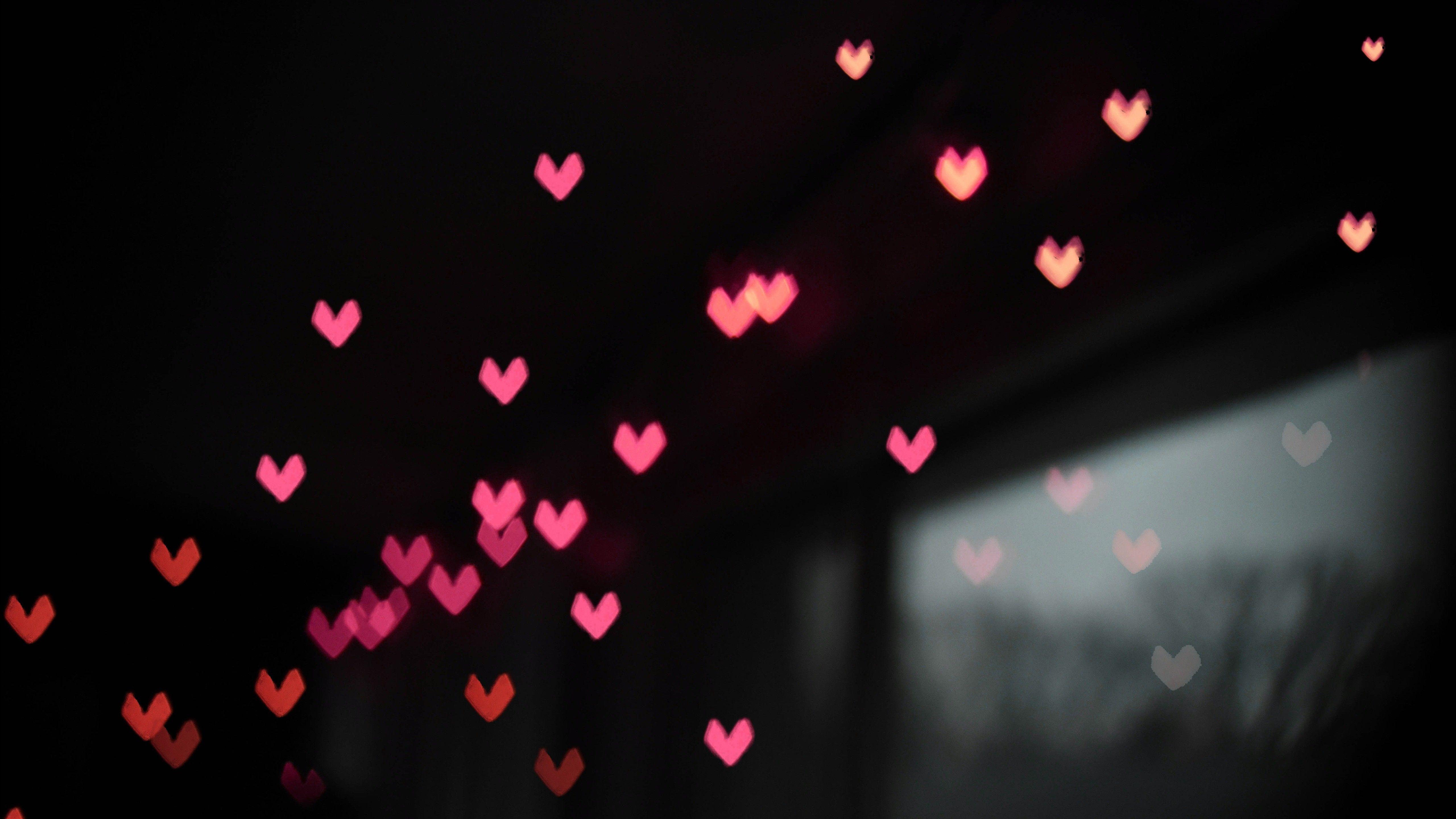 5120x2880 Small Pink Heart in Black Background 5K Abstract Wallpaper