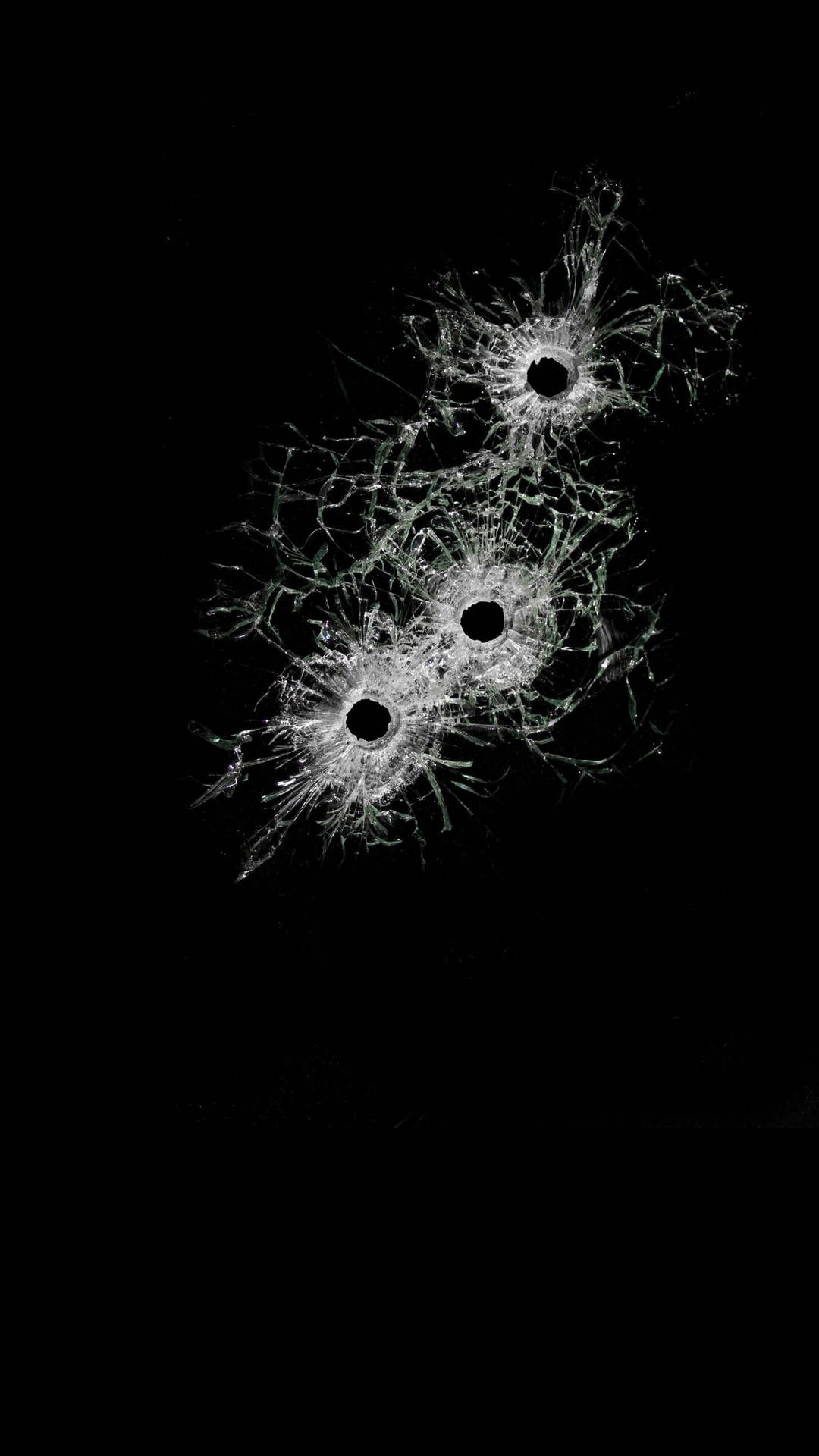 1080x1920 Bullet Holes On Broken Glass Wallpaper