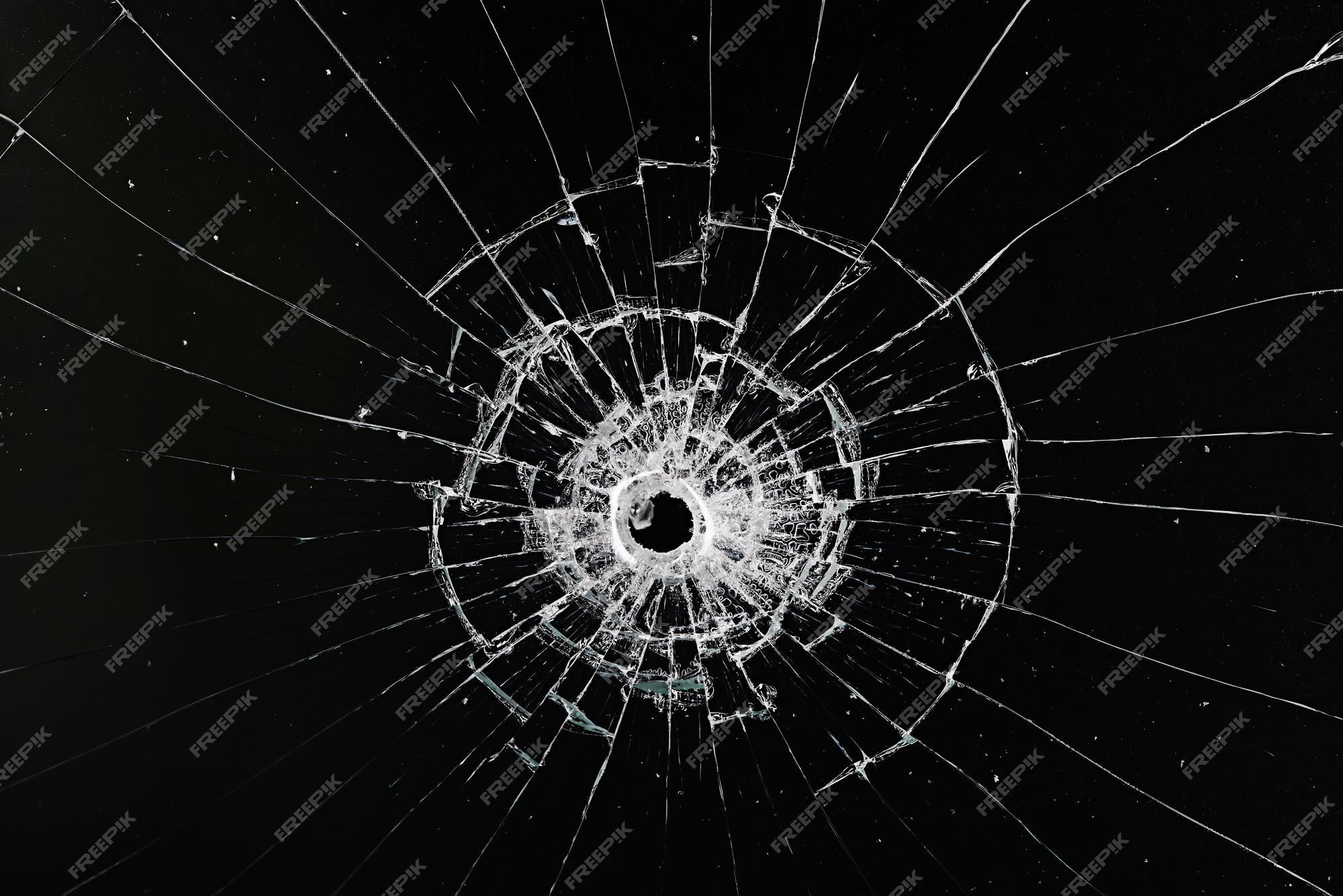 2000x1334 Bullet hole on glass black background