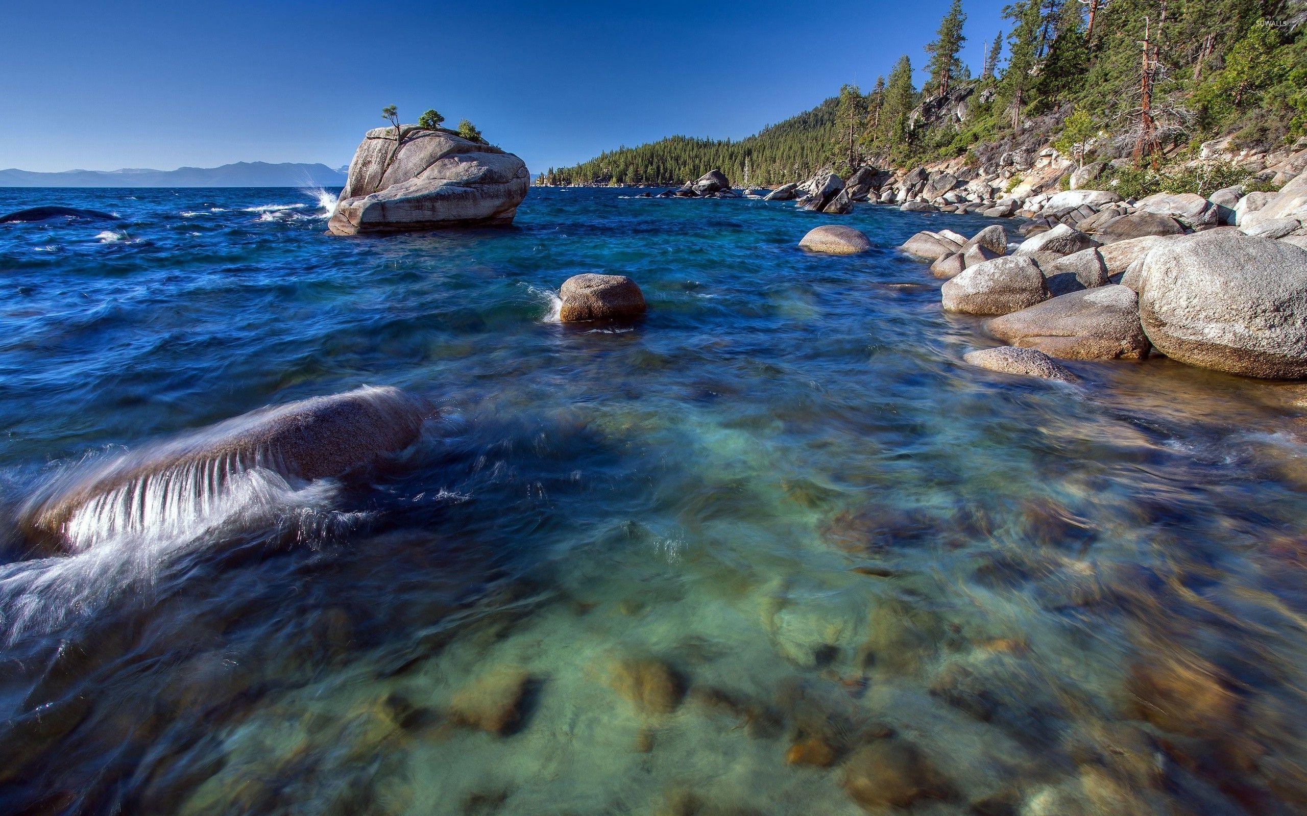 2560x1600 Rocks in the blue ocean water wallpaper wallpaper