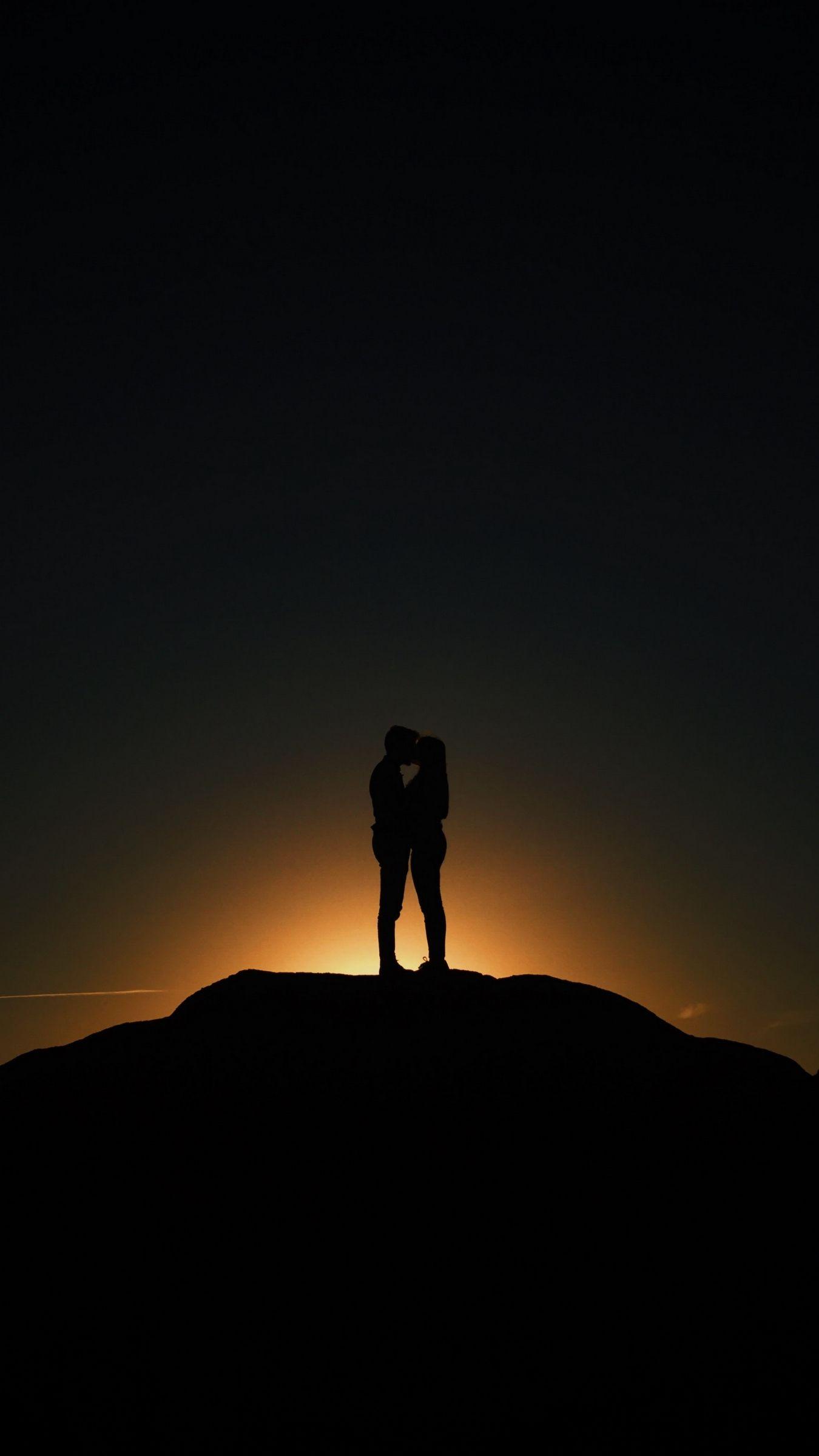 1350x2400 Download wallpaper 1350x2400 couple, kiss, silhouettes, love