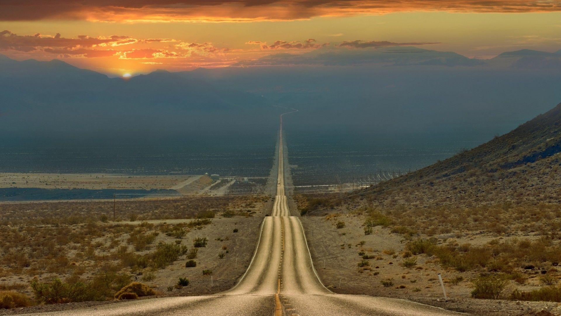 1920x1080 Straight road descends from the mountains, California