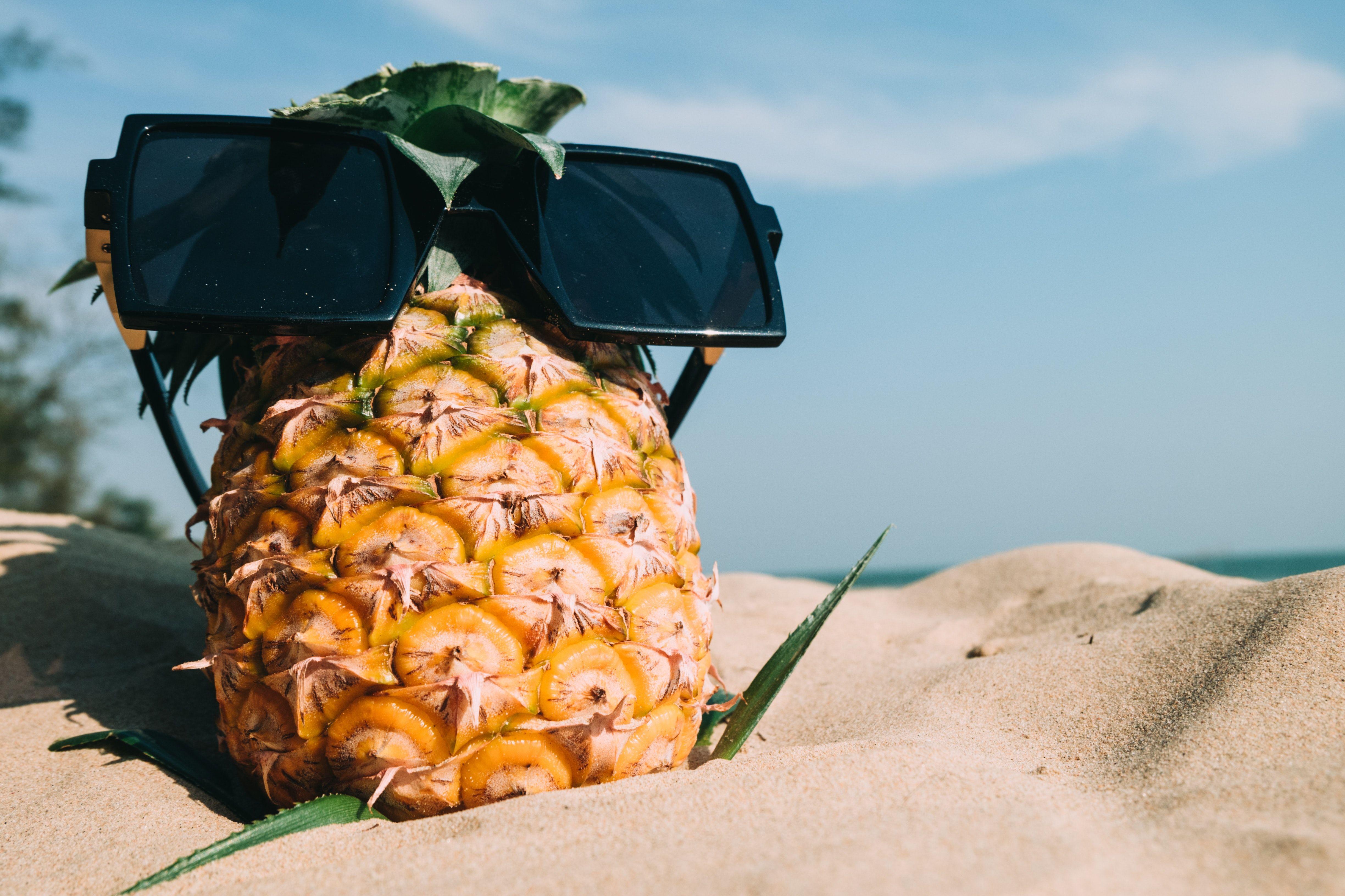 4896x3264 Pineapple Fruit With Sunglasses on Sand · Free
