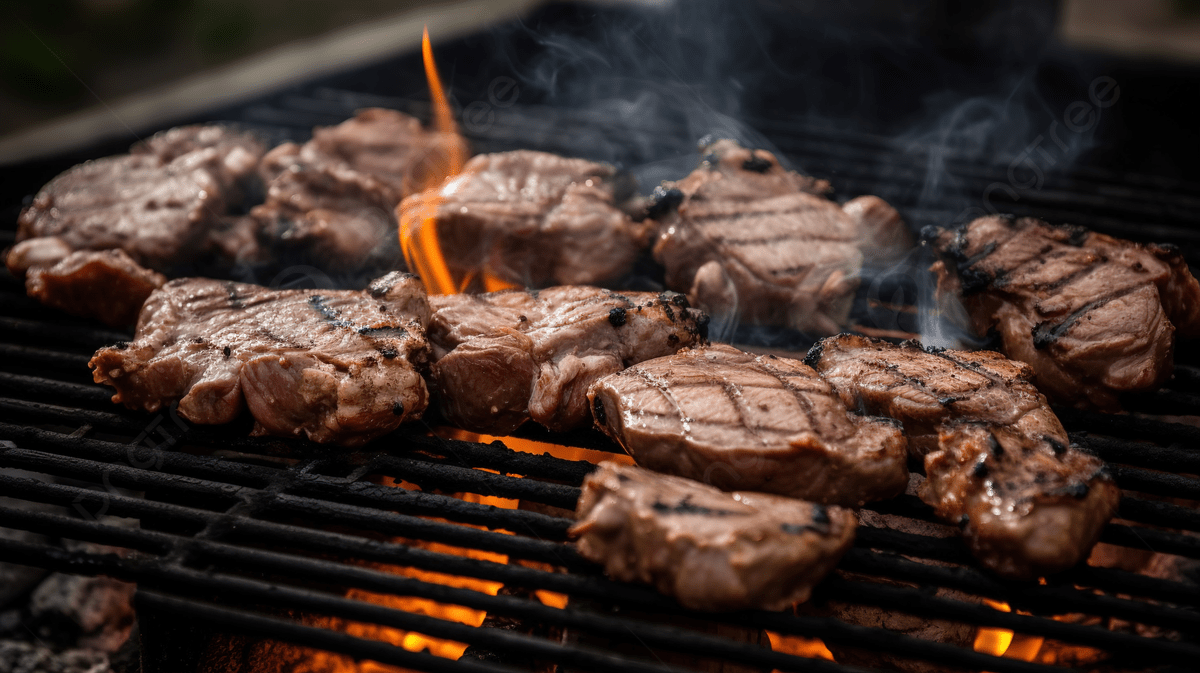 1200x673 Steaks On A Grill With Smoke And Fire