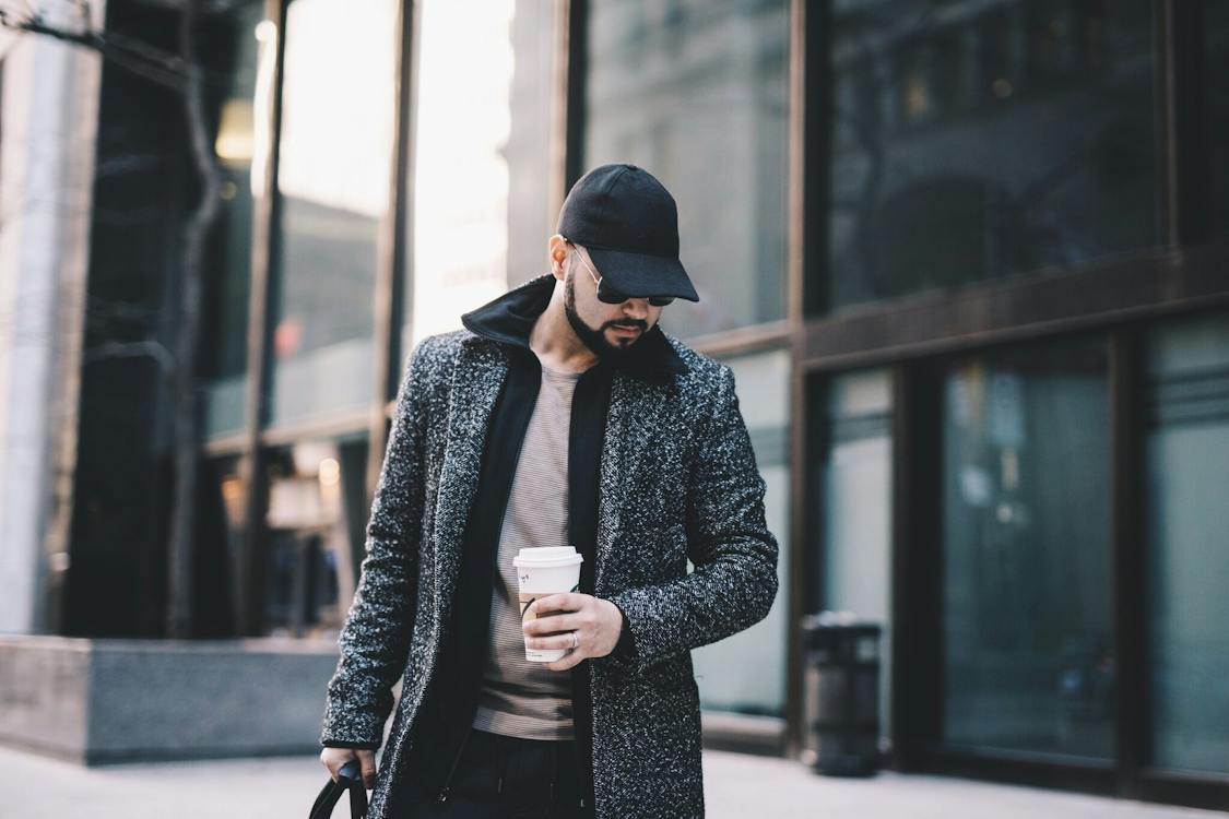 1125x750 Stylish man with coffee to go walking