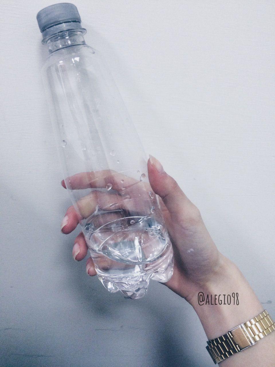 960x1280 Follow me On Instagram Blue bottle of water in a