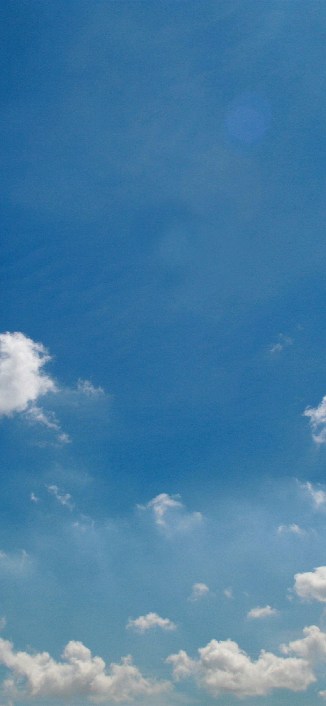 1125x2436 Blue sky, white clouds, nature landscape 1125x2436 iPhone XS