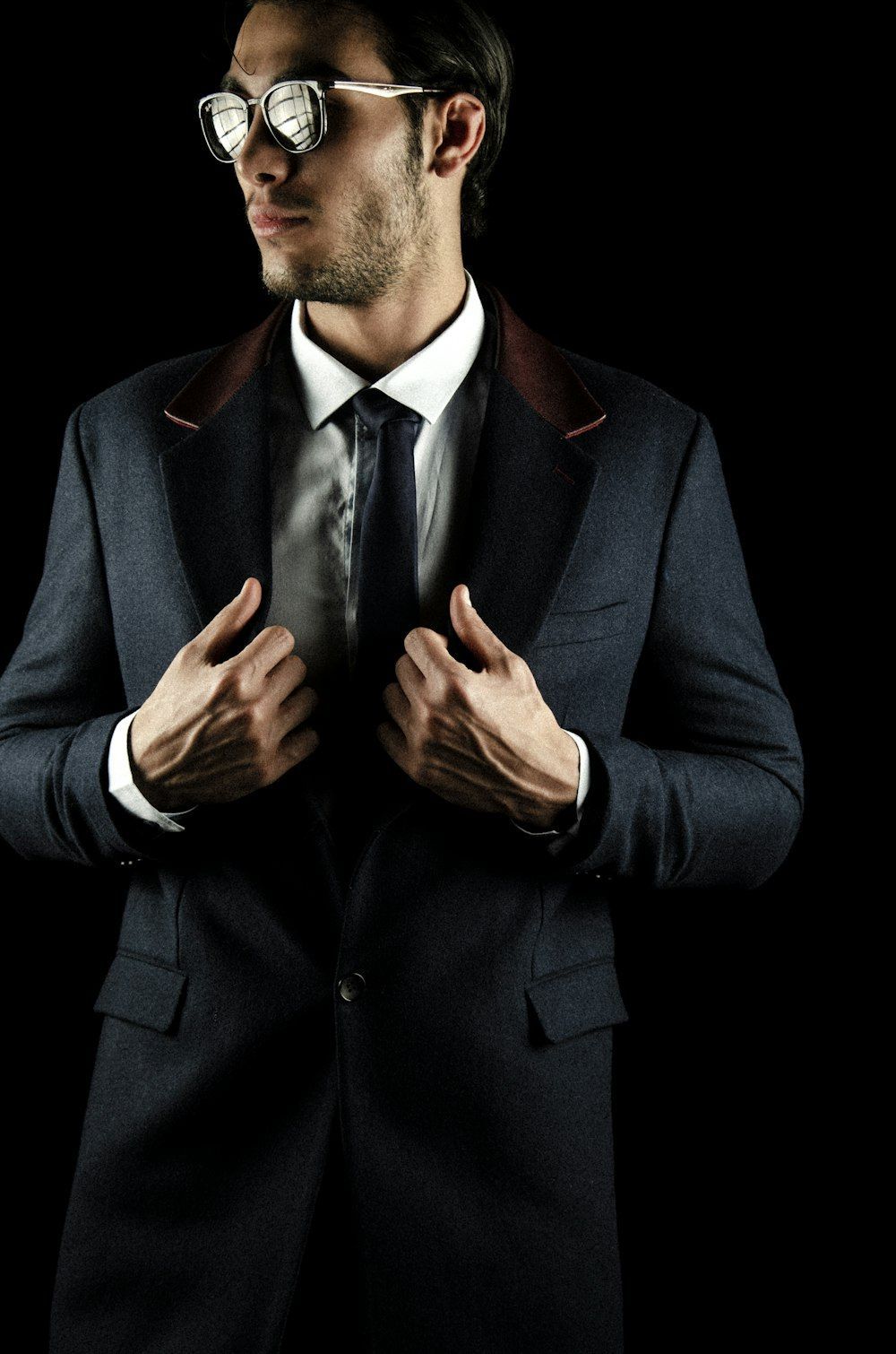 1000x1510 Man in black suit jacket photo