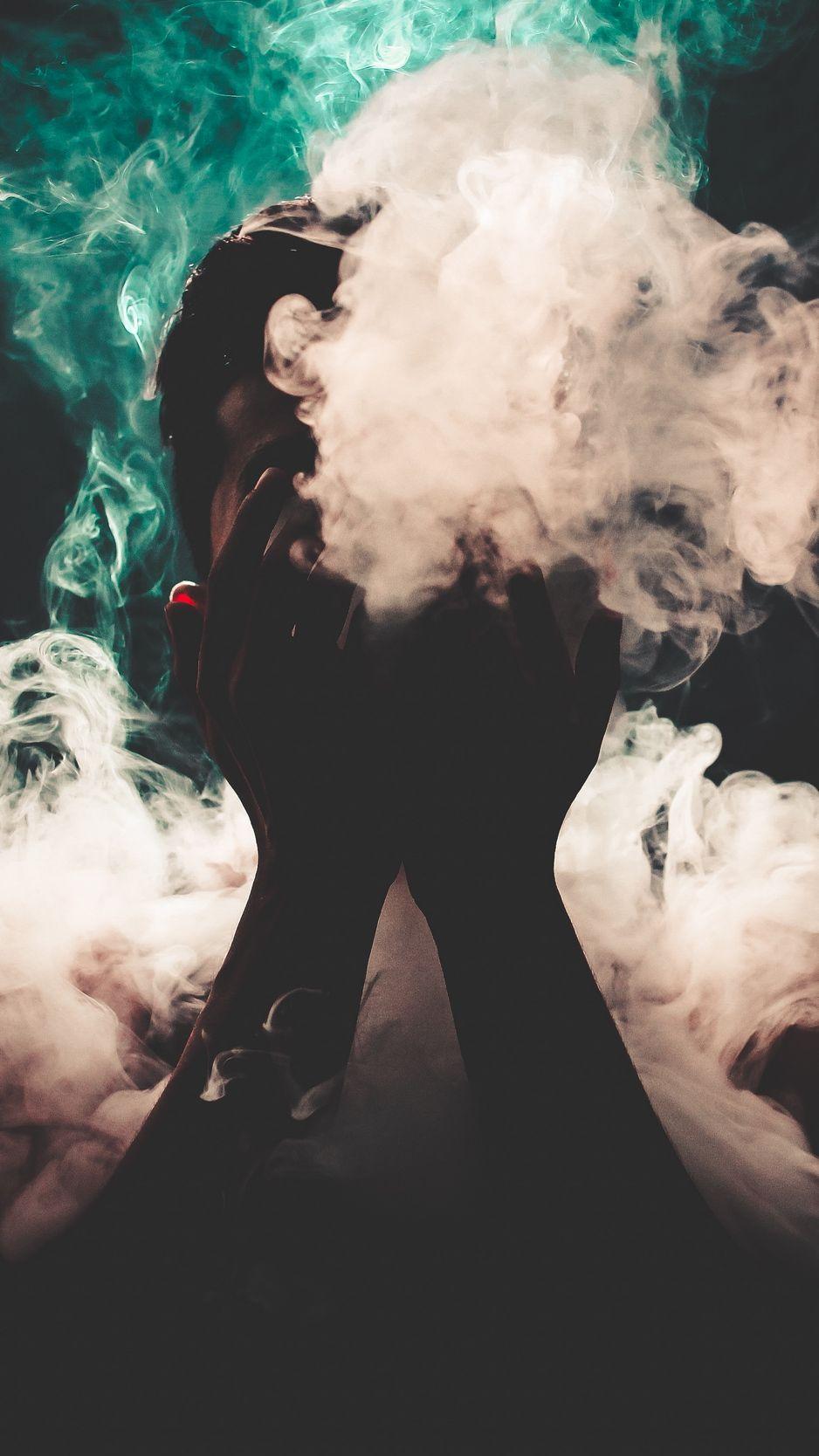 938x1668 Download wallpaper 938x1668 man, smoke, hands, colorful