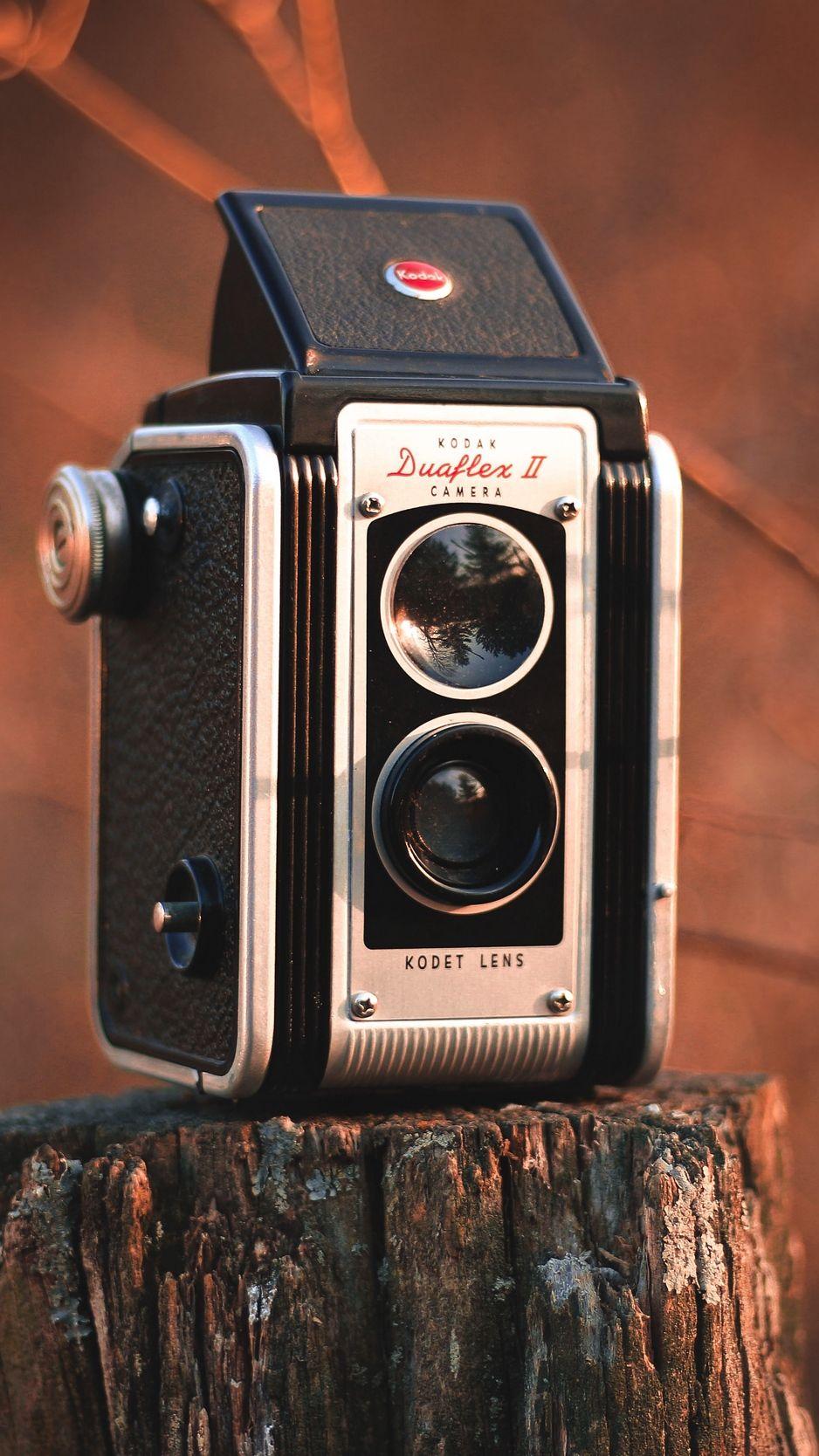 938x1668 Download wallpaper 938x1668 camera, vintage, retro, stump