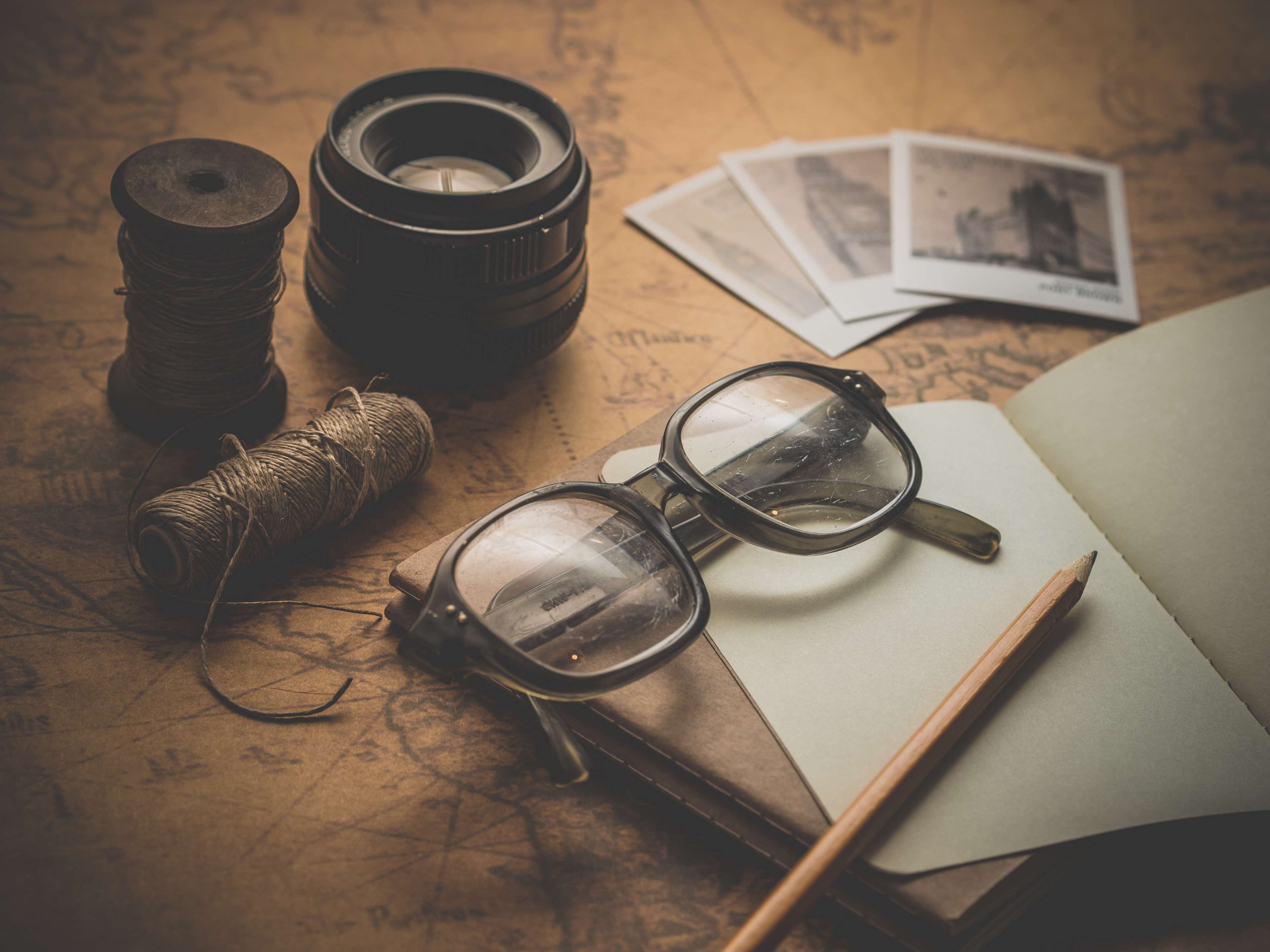 3840x2880 desk, eyeglasses, map, notebook, notepad, photo