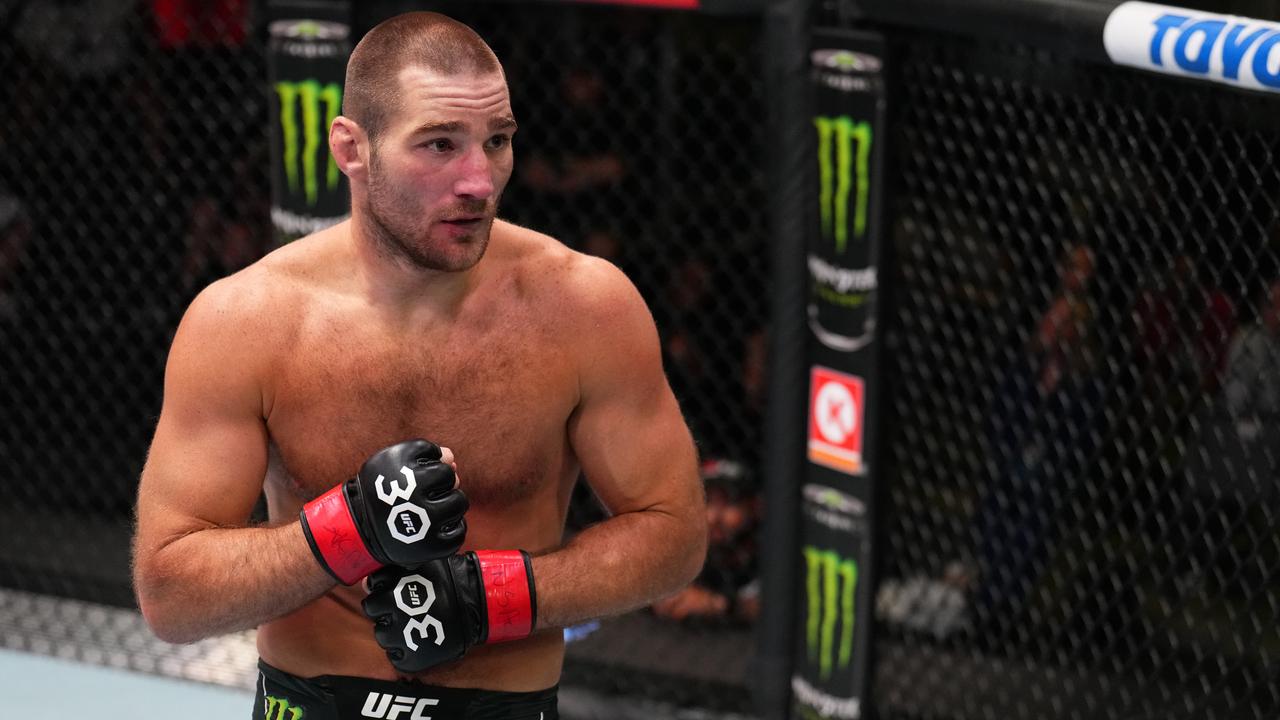1280x720 UFC 293: Sean Strickland punches fan