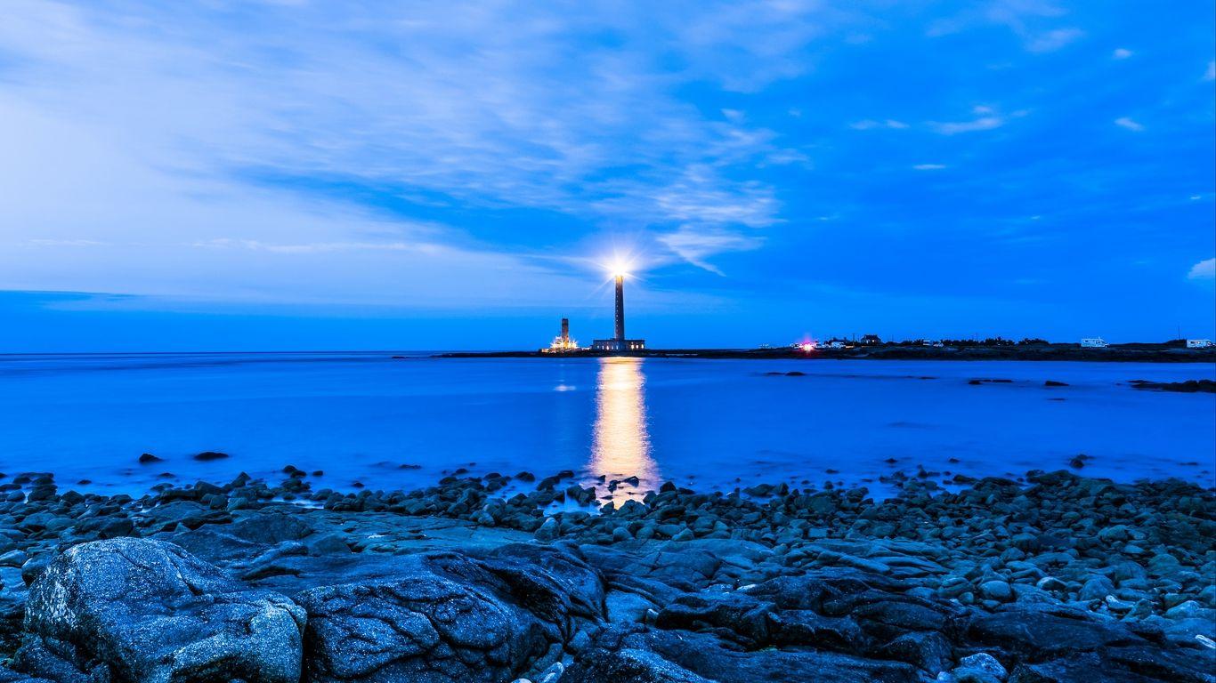 1366x768 Download wallpaper 1366x768 lighthouse, sea, evening, france