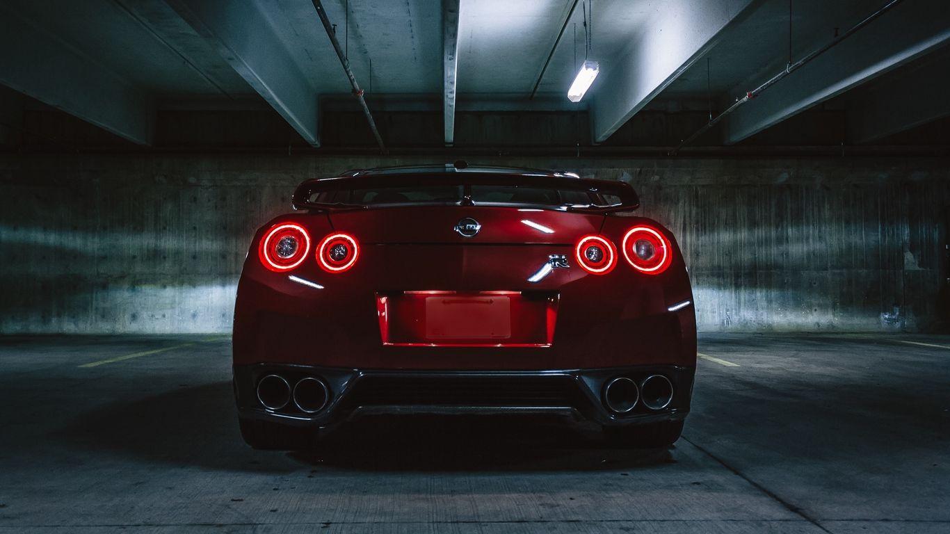 1366x768 Download wallpaper 1366x768 nissan gtr, nissan, headlights