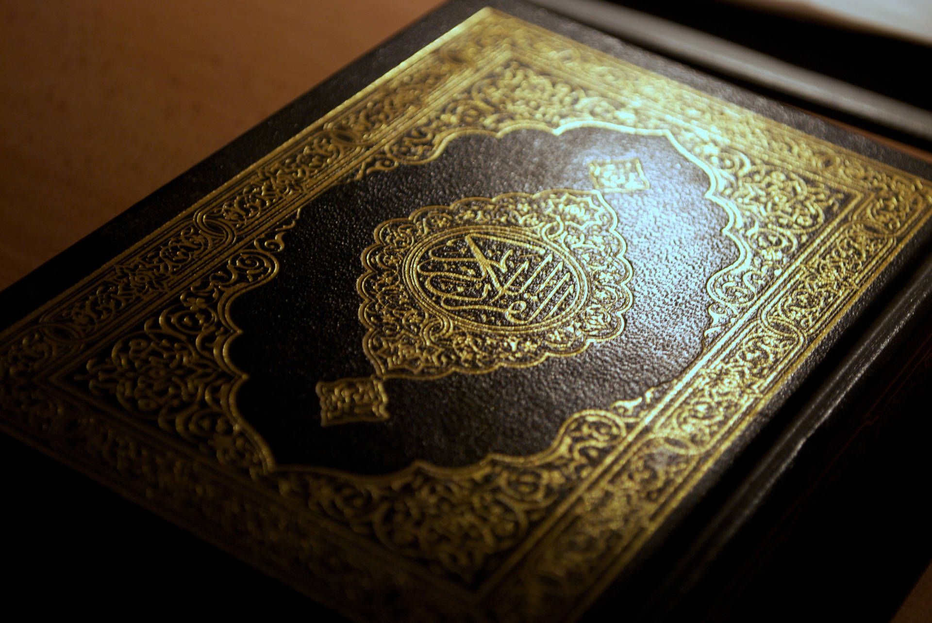 1920x1285 Download An exquisite gold Islamic book cover, beautifully decorated with intricate artwork. Wallpaper