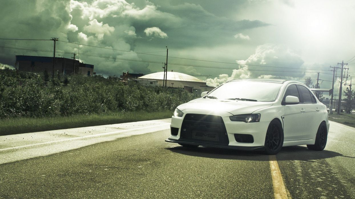 1244x700 Mitsubishi Evo X Desktop Wallpaper