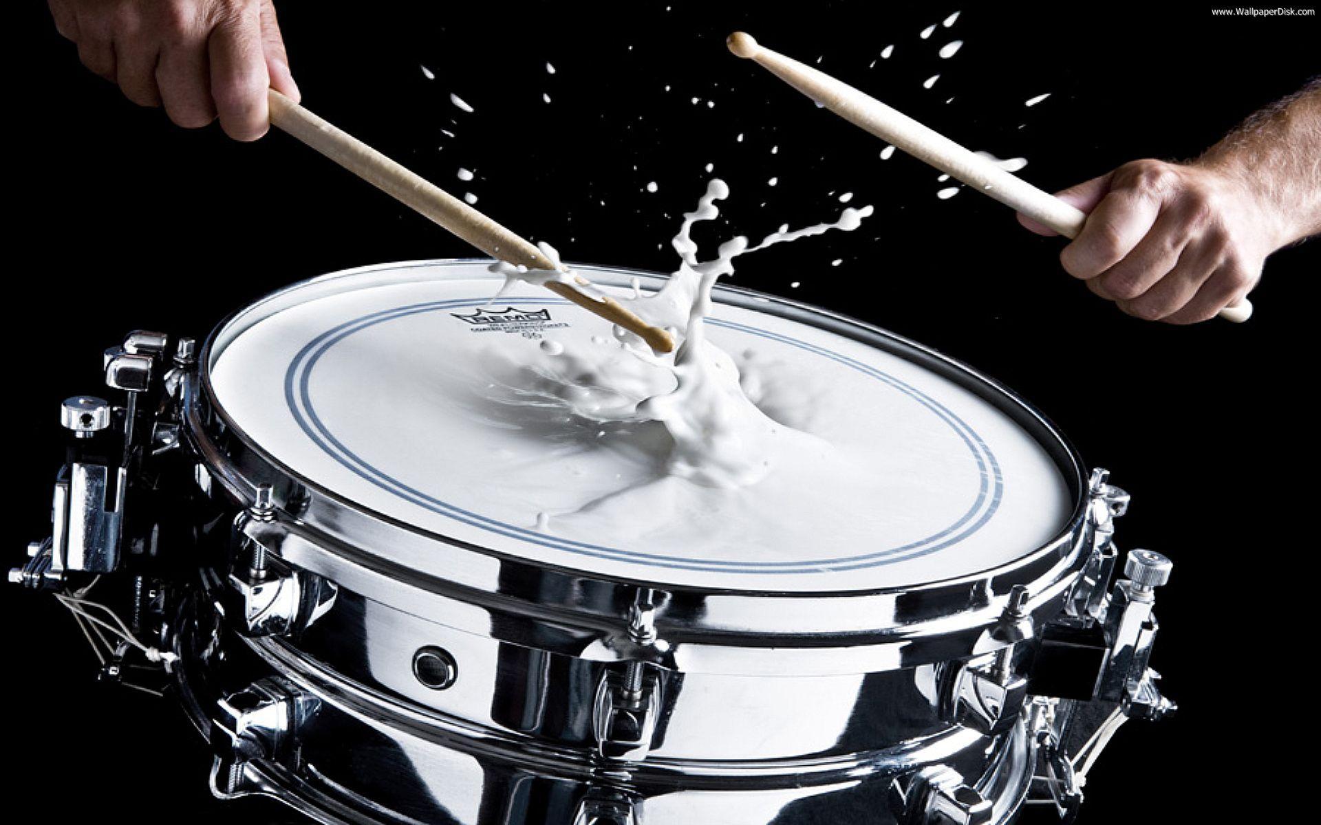 Drum Sticks Hitting Snare Drum with Splashing Water on Black Background  Under Studio Lighting Black and White Close Up Stock Photo  Image of  snare contrast 199351070