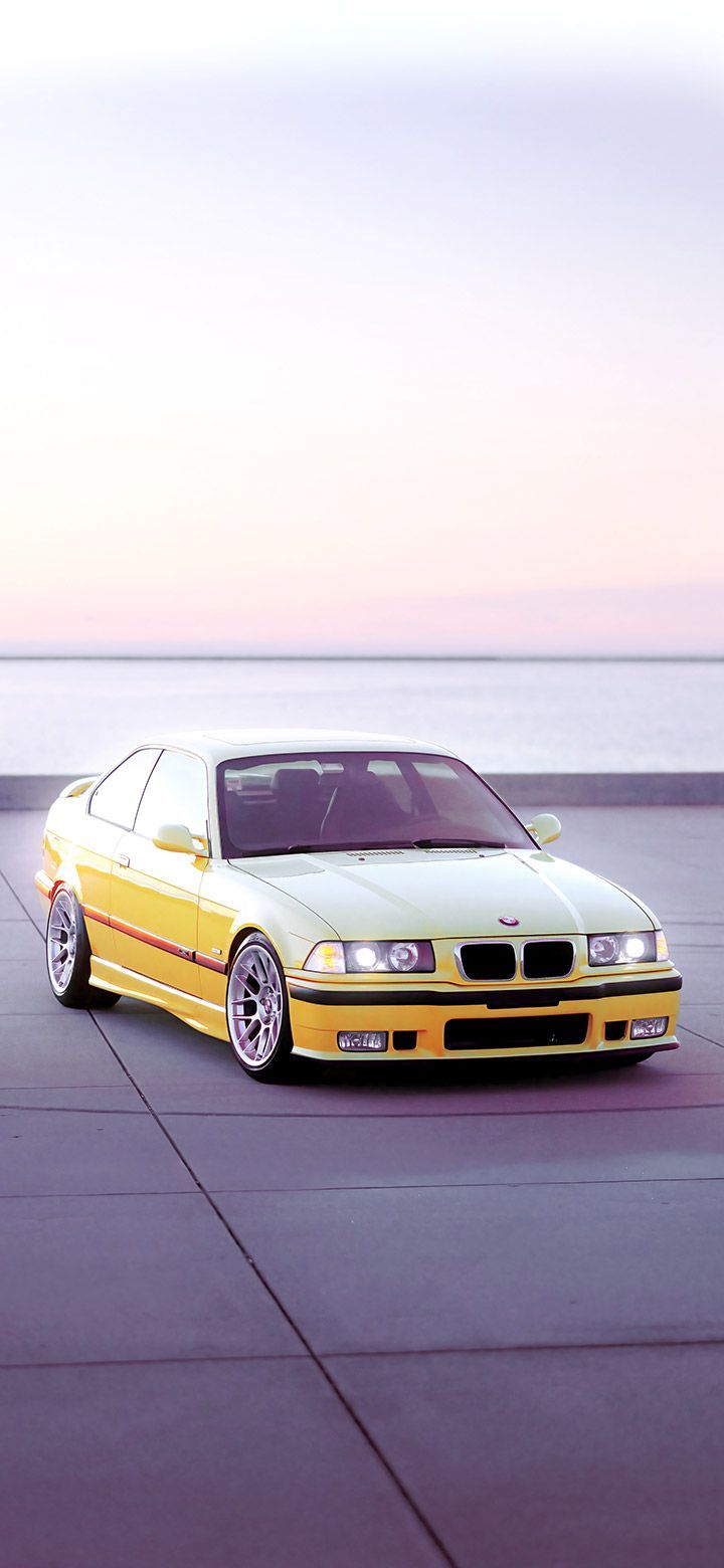 720x1560 Aesthetic BMW Parked Near The Sea 4K
