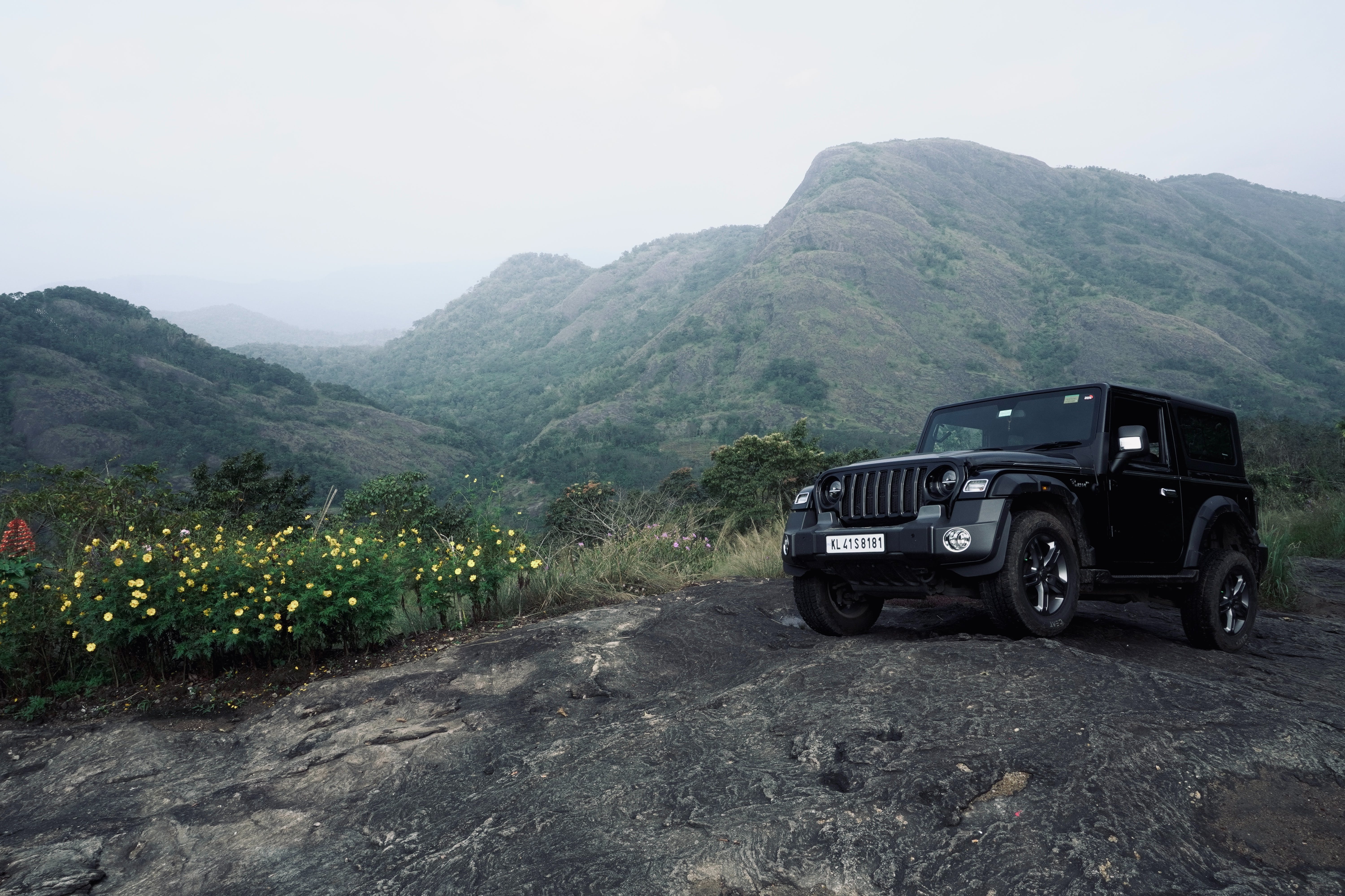 6000x4000 Black Jeep Parked Near Mountains · Free